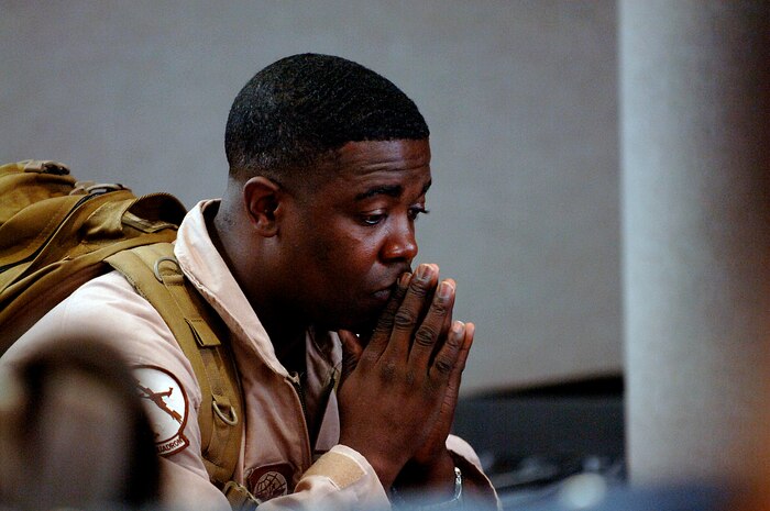 Tech. Sgt. Mike Rodgers mentally prepares himself for a deployment before departing the Charleston AFB flightline Monday. The 14th Airlift Squadron deployed to Southwest Asia as part of the 816th Expeditionary Airlift Squadron for four months in support of current operations in Iraq and Afghanistan. Sergeant Rodgers is loadmaster with the 14 AS. (U.S. Air Force photo/Senior Airman Nicholas Pilch)