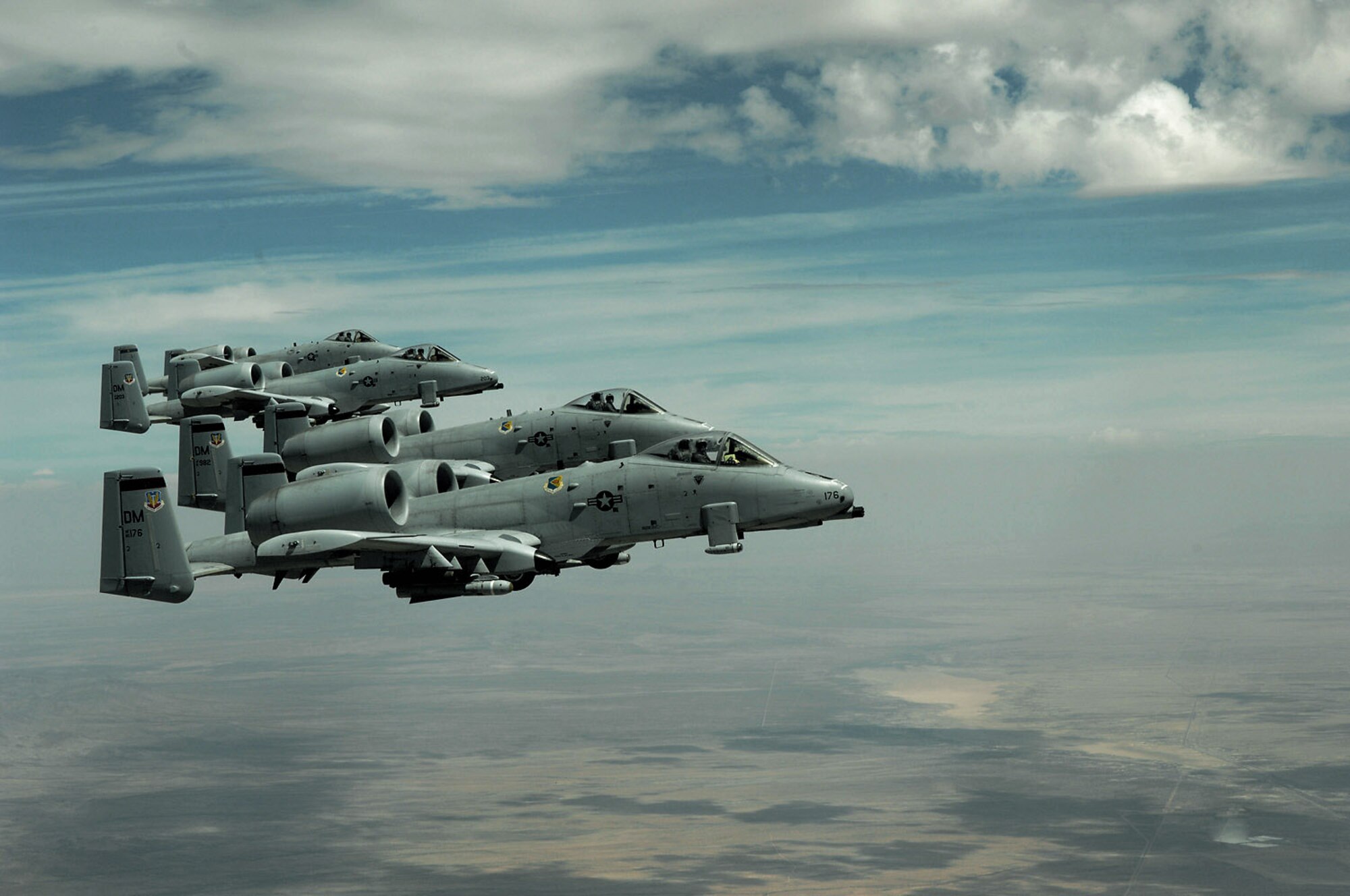 Four A-10 Thunderbolt IIs from the 355th Fighter Wing at Davis-Monthan Air Force Base, Ariz., fly in formation over Arizona April 29.  The A-10s received in-flight refueling from a KC-135 Stratotanker from the Arizona Air National Guard's 161st Air Refueling Wing based in Phoenix.  (U.S. Air Force photo/Senior Airman Alesia Goosic)