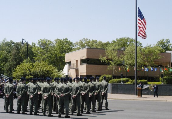 Members of the 43rd Flying Training Squadron, 50th Flying Training Squadron and Specialized Undergraduate Pilot Training 08-14 stand in formation at the memorial service Tuesday. (U.S. Air Force photo Airman Josh Harbin)