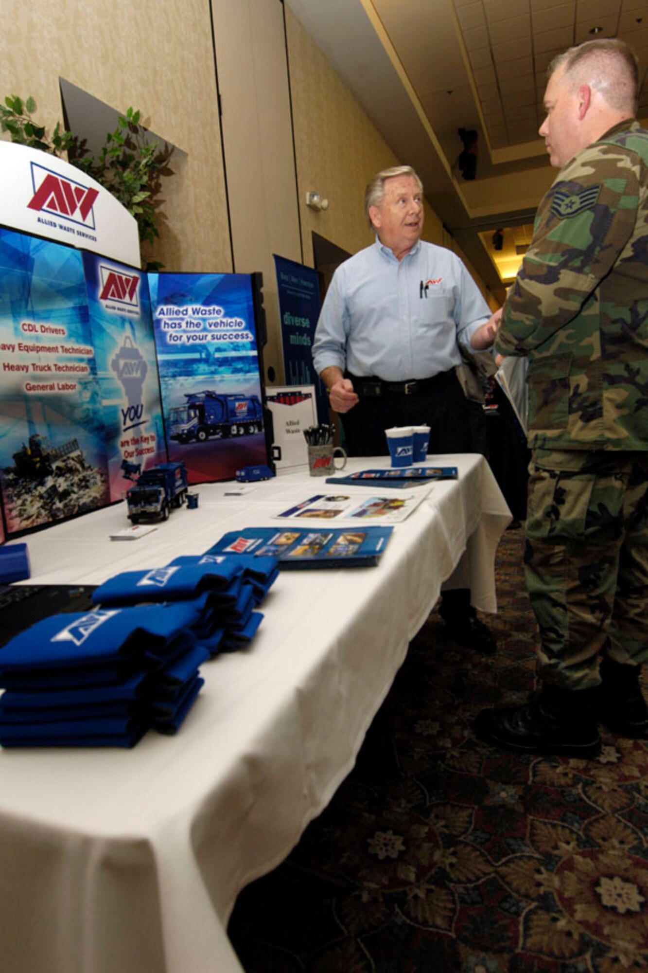 SCOTT AIR FORCE BASE, Ill. -- A representative from Allied Waste services discusses career opportunities with members of JTF Scott. (U.S. Air Force photo/Senior airman Jonathan Lovelady)