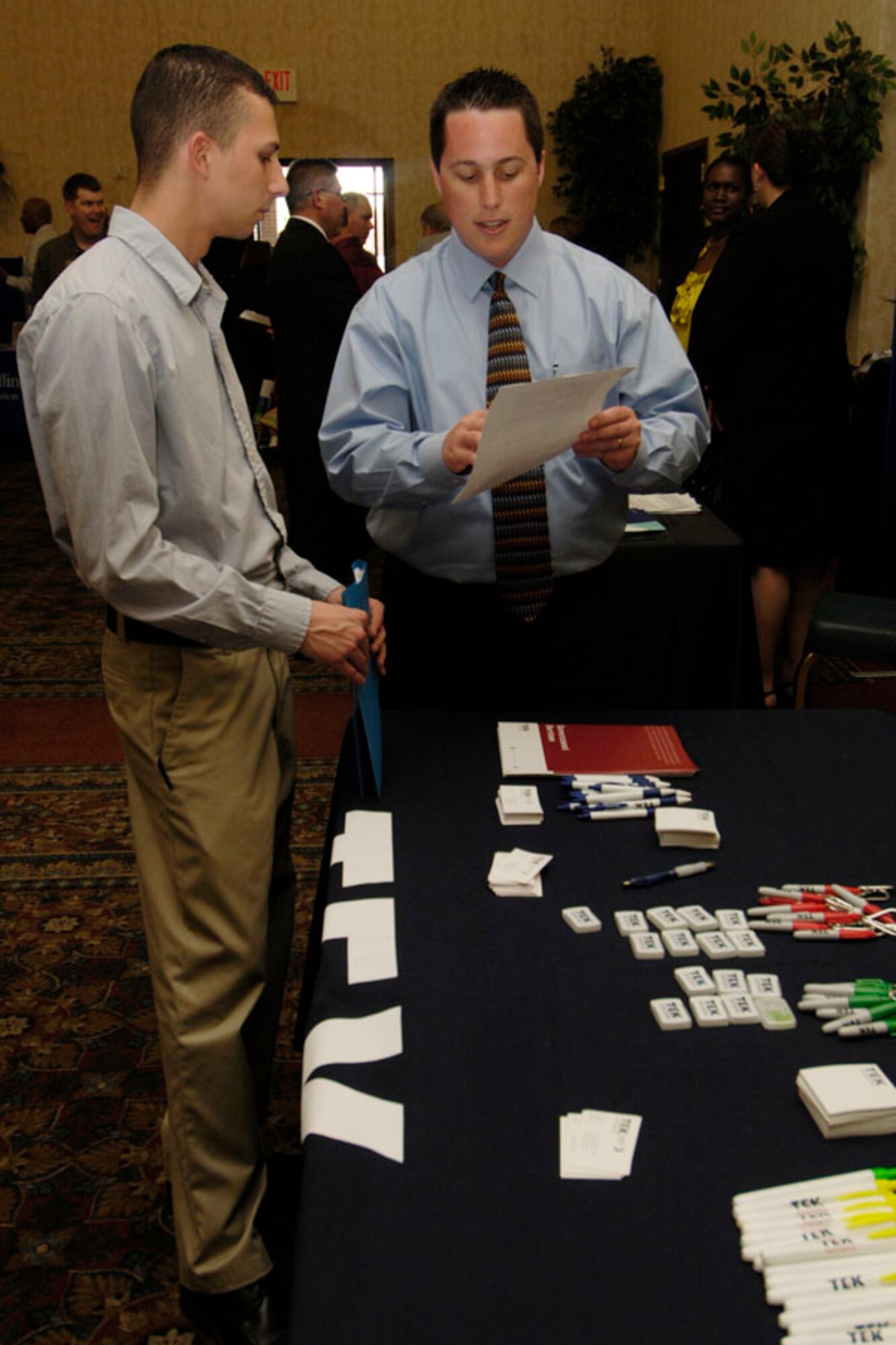 SCOTT AIR FORCE BASE, Ill. -- Representatives form various businesses discuss career opportunities. (U.S. Air Force photo/Senior airman Jonathan Lovelady)