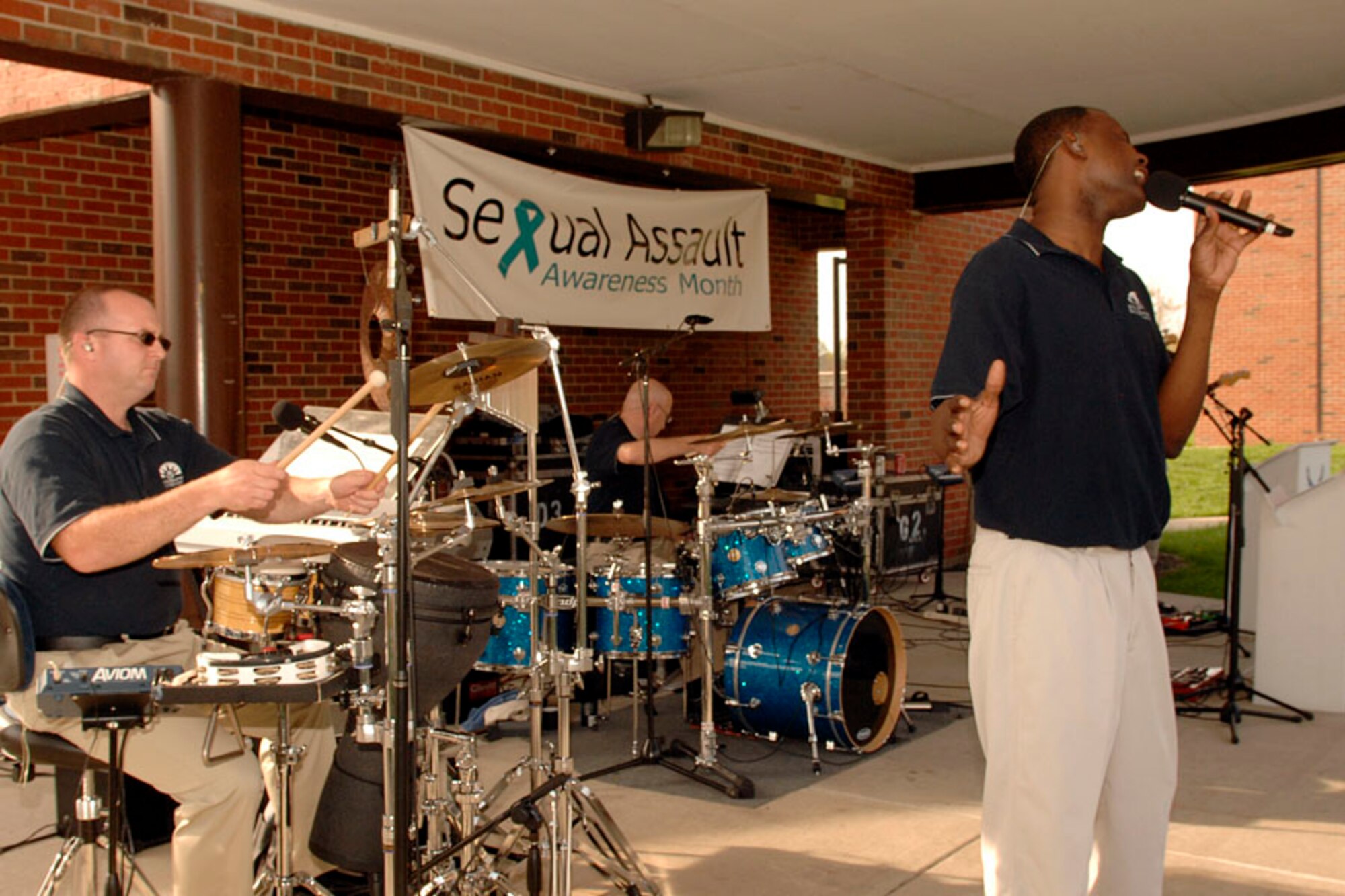 SCOTT AIR FORCE BASE, Ill. -- The Band of Mid America's Starlifter Band performs during the Dorm Jam at the dorm campus pavilion April 23. The event was held to create awareness for sexual assault. (US Air Force photo/Airman 1st Class megan Gilliland)
