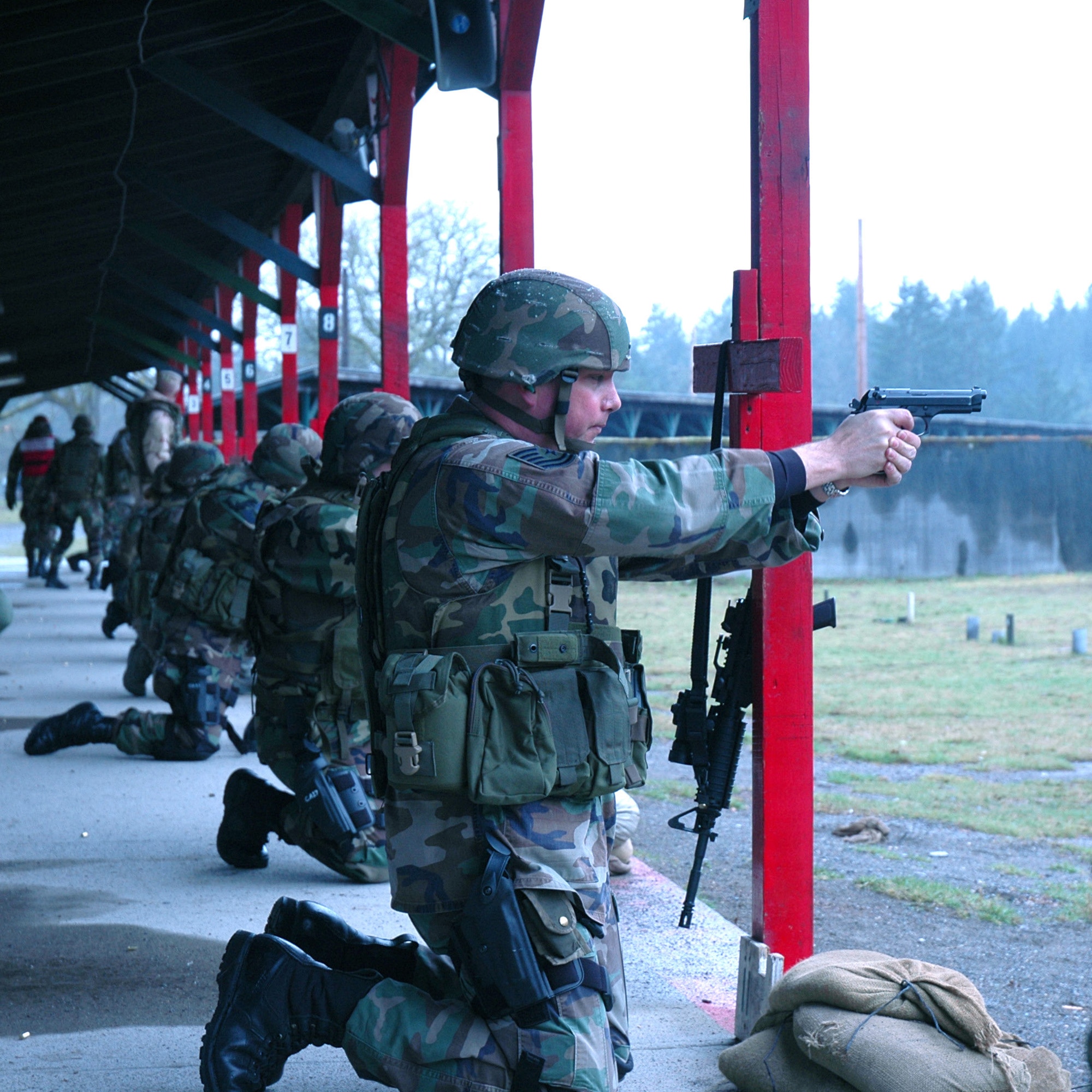 Reserve Airmen from the 446th Security Forces Squadron, McChord Air Force Base, Wash., complete weapons training during a unit training assembly weekend in March.  Regular training on weapons, defensive technicques, and hand-to-hand combat are just a few of the demands on security forces Airmen, particularly those supporting Air Mobility Command's RAVEN program.  RAVENs provide security for Air Force aircrews and assets while on missions here and abroad. (U.S. Air Force photo/Senior Airman Desiree Kiliz)