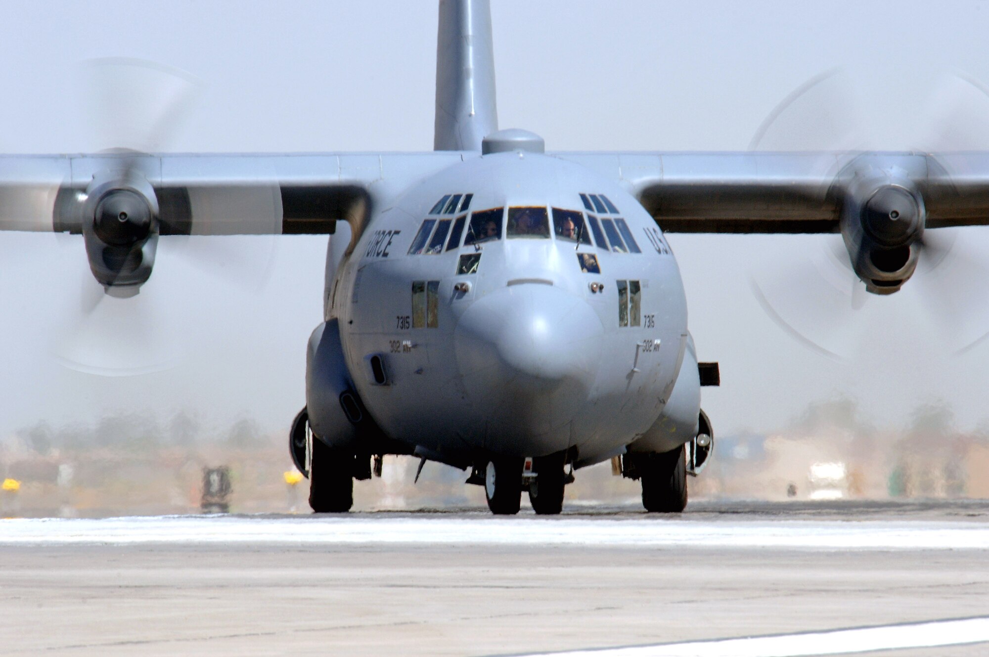 A C-130 Hercules taxis at Balad Air Base, Iraq, after an Operation Iraqi Freedom mission. The C-130 provides intra-theater heavy airlift throughout Southwest Asia.  The C-130 is deployed from the Colorado Air National Guard's 439th Airlift Wing in Colorado Springs. (U.S. Air Force photo/Staff Sgt. Tony R. Tolley)