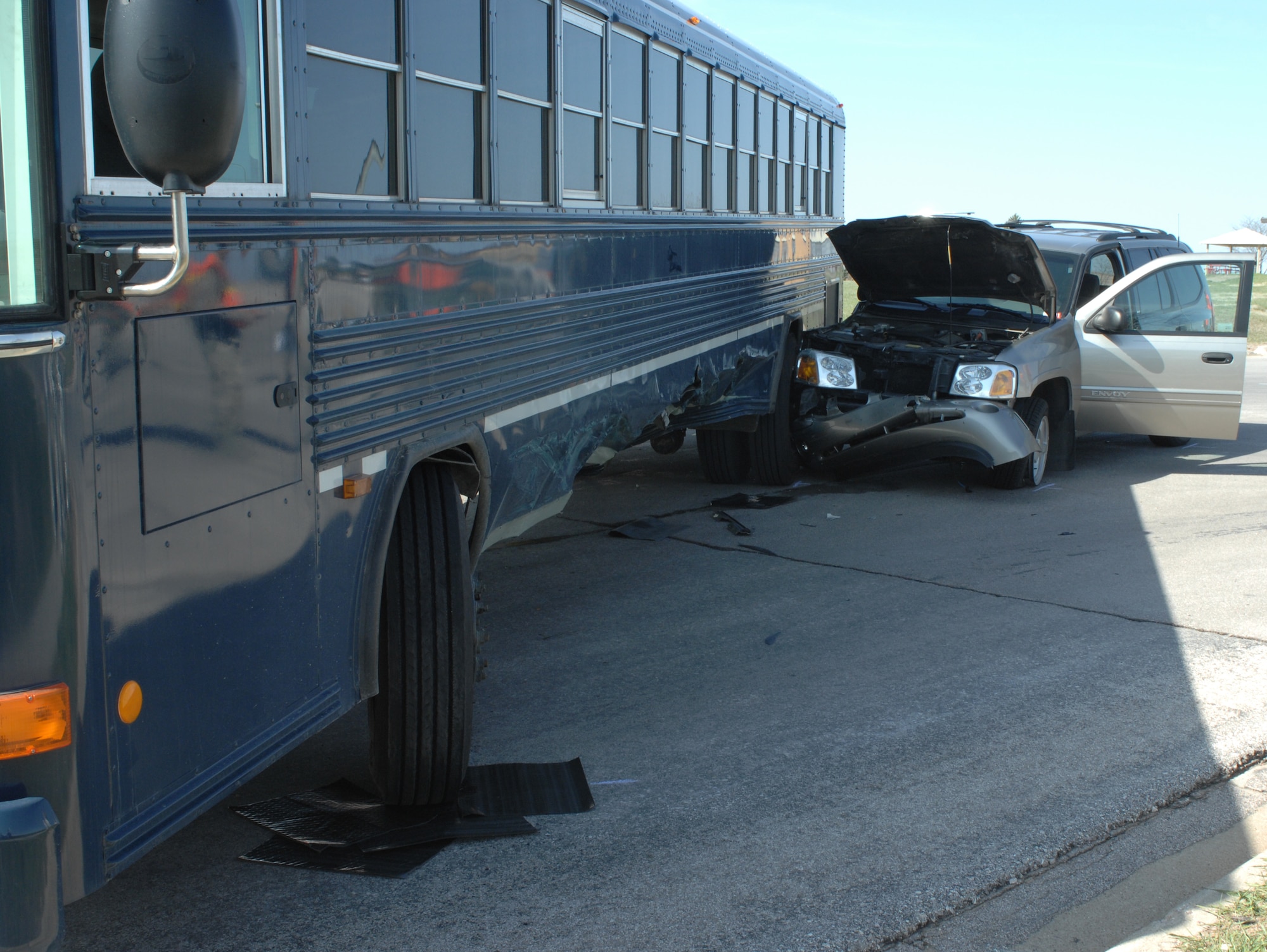 Two servicemembers and one civilian were involved in a vehicle accident at the intersection of Scott Drive and Ellsworth Street on April 29.  The servicemembers were in a 44-passenger bus, and the civilian was operating a sports utility vehicle when the accident occurred. (U.S. Air Force photo/Airman 1st Class Joshua Seybert) 