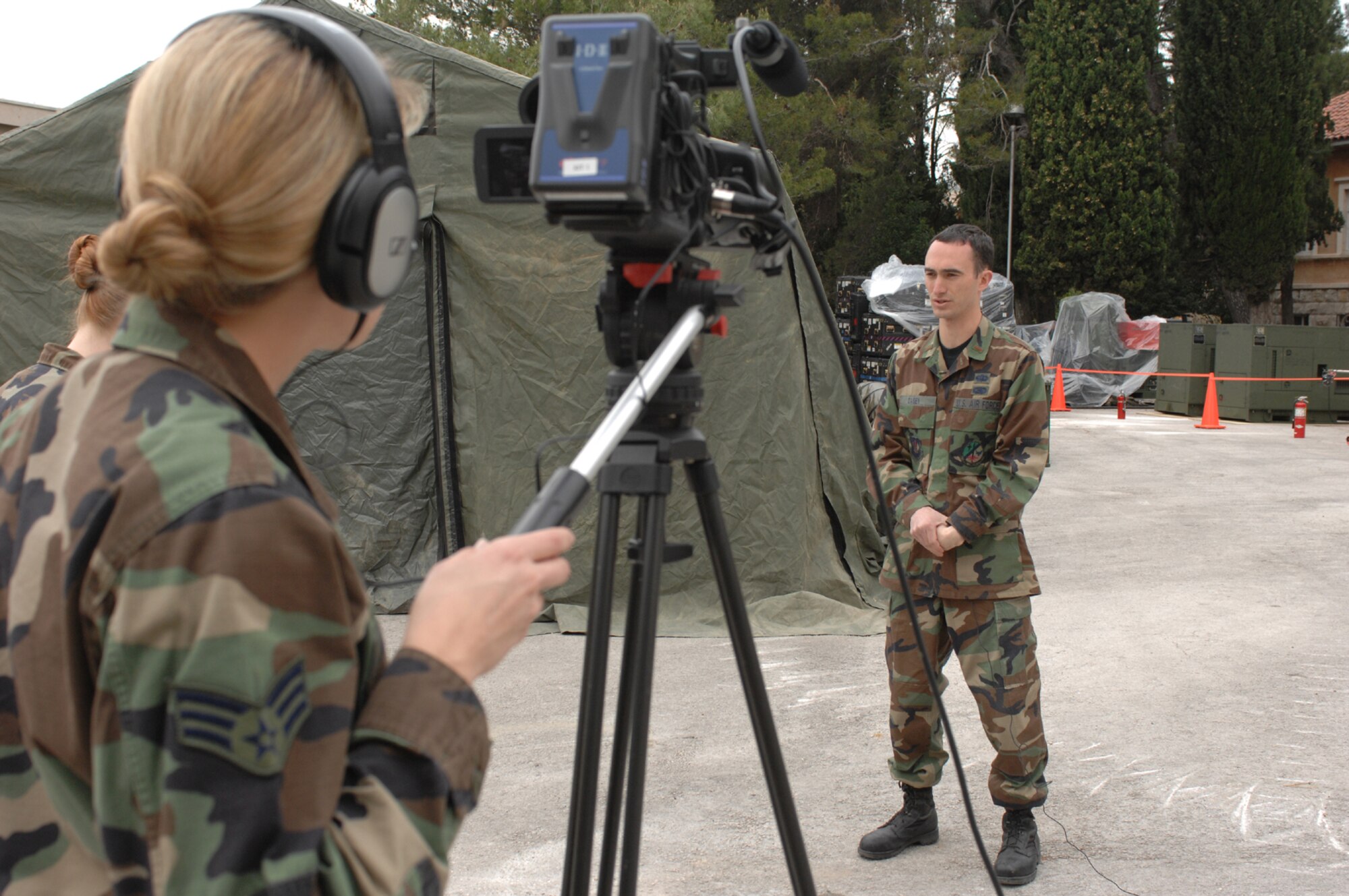 DIVULJE TRAINING BASE, Croatia – U.S. Air Force Senior Airman Lana Mills, 52nd Fighter Wing, Spangdahlem Air Base, Germany, records her interview April 29 of U.S. 2nd Lt Dan Casey, 1st Combat Communications Squadron, Ramstein Air Base, Germany, during the Medical Central and Eastern Europe Exercise 2008 (MEDCEUR 08). Seventeen nations are participating in the exercise May 2 through 15. The exercise focuses on mass-casualty training scenarios and humanitarian aid in response to crises situations. More than 400 multi-nationals are attending the exercise in support of the Partnership for Peace initiative. (U.S. Air Force photo/Staff Sgt. Kristin Ruleau) 