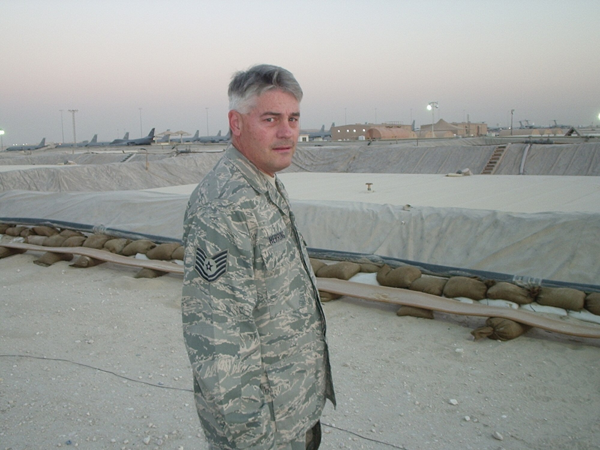 SEYMOUR JOHNSON AIR FORCE BASE, N.C. -- Tech. Sgt. Charles Herring checks the refueling yard at Al Udeid, Qatar. Regular checks look for foreign objects, vehicle fluid leaks and other oddities. Sgt. Herring is a Reservist with the 916th Logistics Readiness Squadron and is deployed as a fuels technician.
