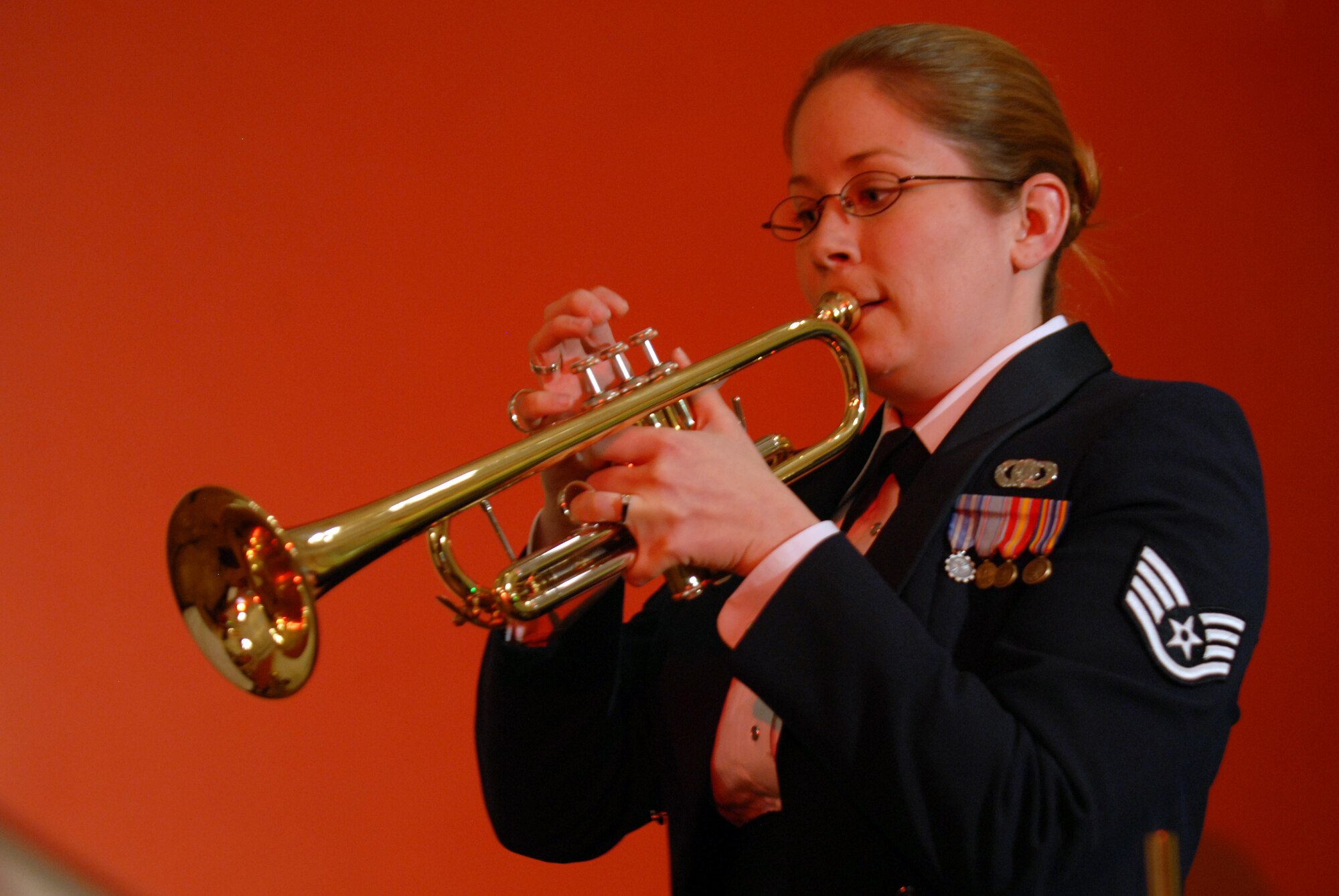 Staff Sgt. Brenna Dooley, U.S. Air Forces in Europe's Band Five Star Brass, plays the trumpet for a concert in Szczecin, Poland, April 20. Winds Aloft and the Five Star Brass performed six concerts during their tour in Poland. (U.S. Air Force Photo by Airman 1st Class Ruth Holcomb) (Released)