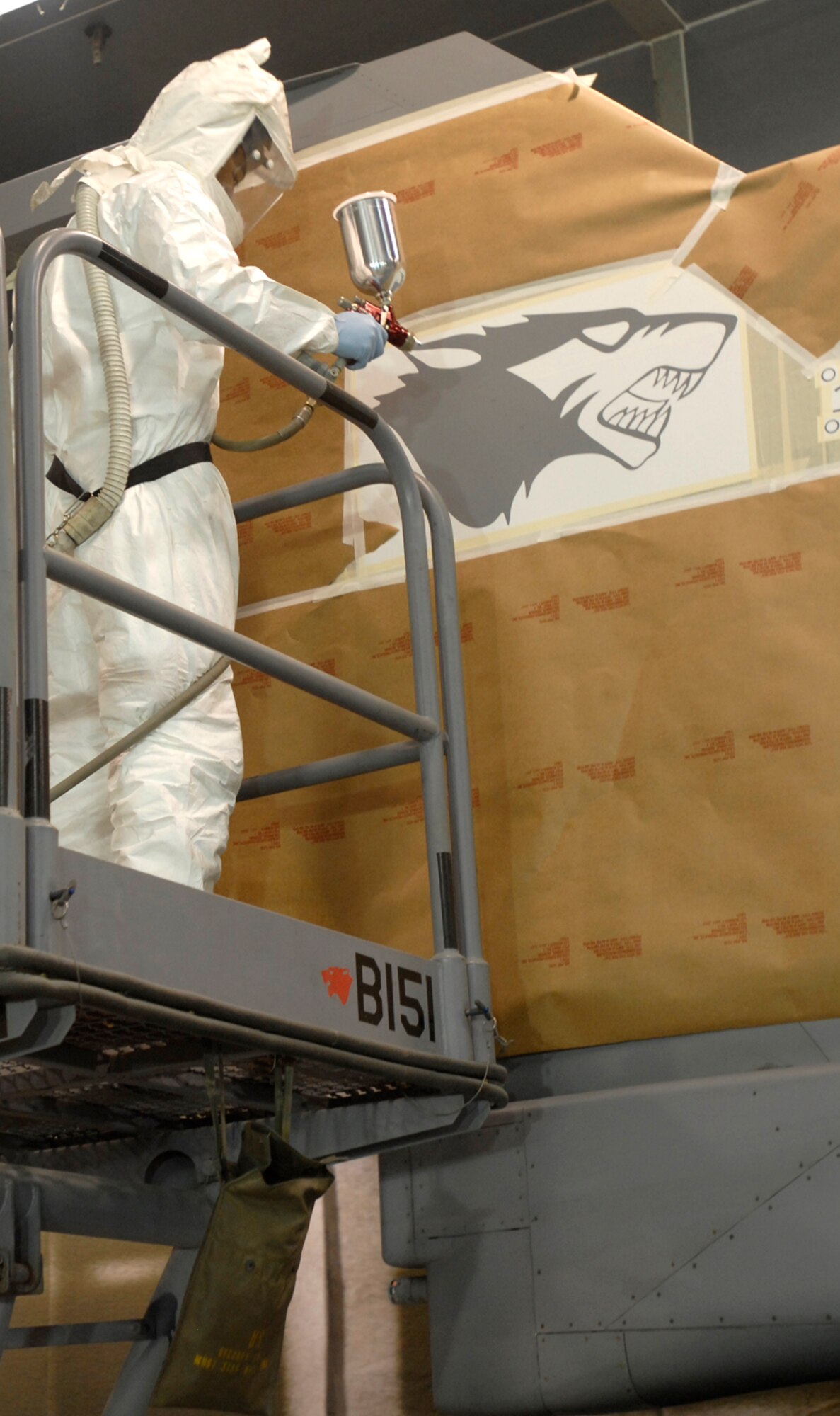 Kunsan Air Base, Republic of Korea –  Senior Airman Brian Sheppard, 8th Maintenance Squadron aircraft structural maintenance journeyman, paints the last “WP” emblem onto one of the last F-16 that the base received here April 30. The F-16 was flown from Eielson Air Force Base Alaska. The 8th Maintenance Squadron turned over 24 jets in a two month time period. (U.S. Air Force photo/Senior Airman Dana D. Hill) 