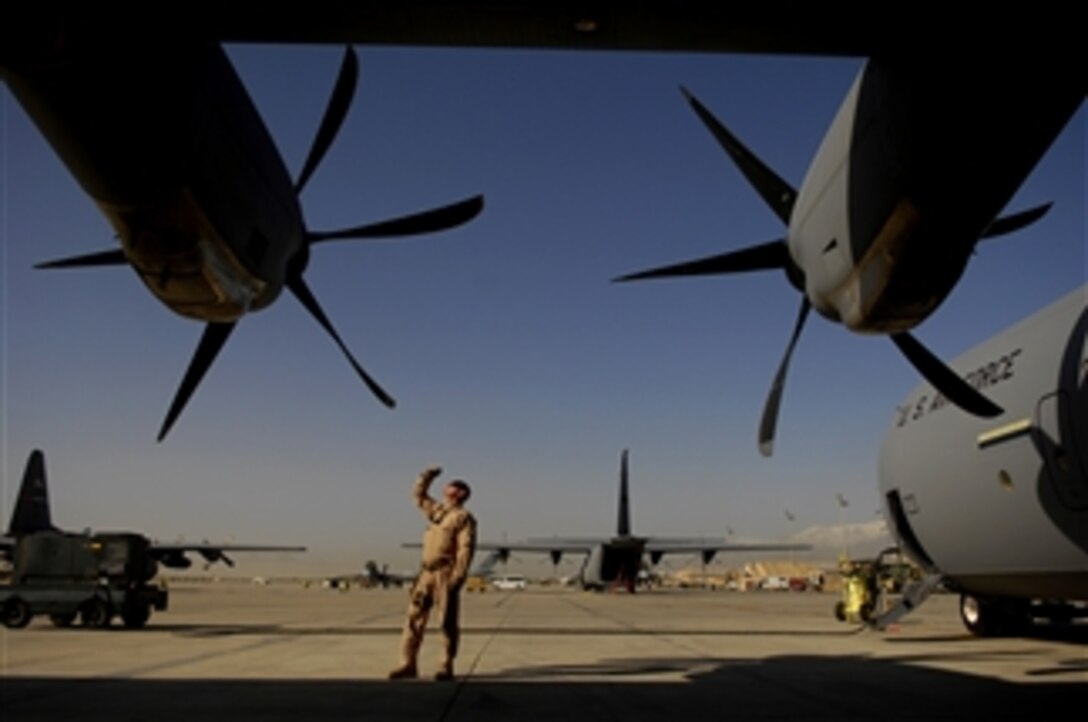 U.S. Staff Sgt. Brian Miliefsky preflights a C-130J Hercules aircraft for a mission at Bagram Air Field, Afghanistan, on April 29, 2008.  Miliefsky is a load master assigned to the 774th Expeditionary Airlift Squadron and deployed from the 115th Airlift Squadron, Channel Island Air National Guard Station, California Air National Guard, Port Hueneme, Calif.  