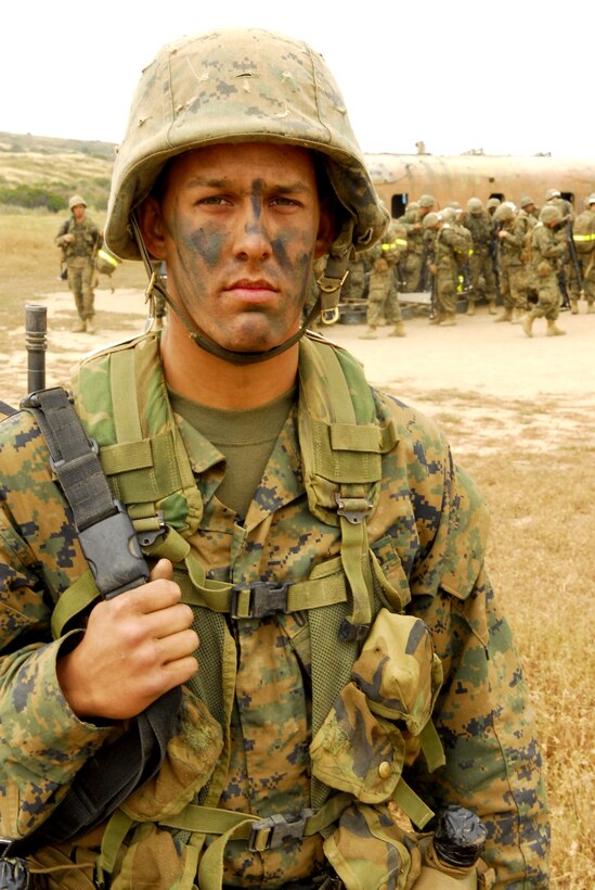 Recruit John Kidwell, Platoon 1063, Company D, looks across Edson Range while waiting for his platoon to form up to move to the next obstacle of the Crucible, April 30. Kidwell, from Santee, Calif., comes from a family of Marines.