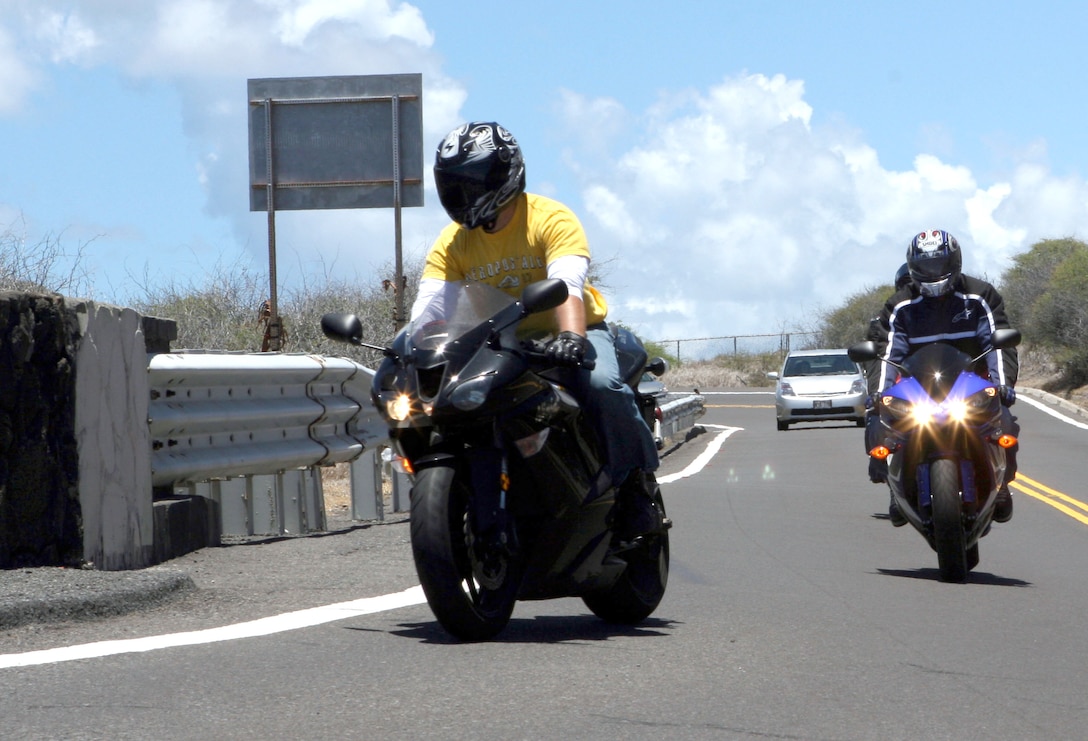 U.S. Marine Corps Forces, Pacific, riders on sport bikes make their first stop at a scenic lookout during the first Ride Safe Club ride August 1. The ride was split between the sports bike and cruisers. All the riders rode the same route, but the groups rode in opposite directions.