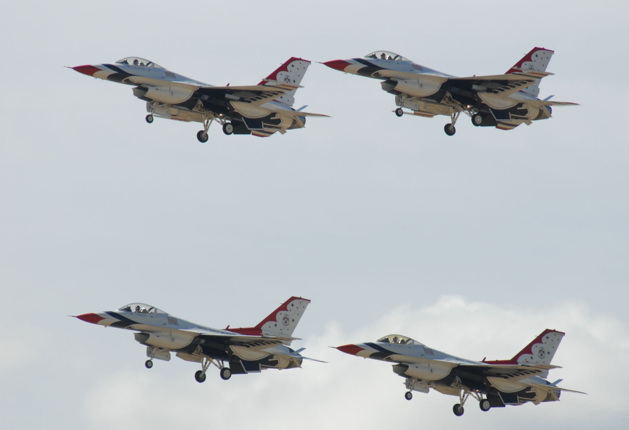 Four members of the Air Force Thunderbirds fly low above spectators at the 55th Annual Thunderbird Air Show above Laramie County Community College July 23(Photo by Shelley Raffl).