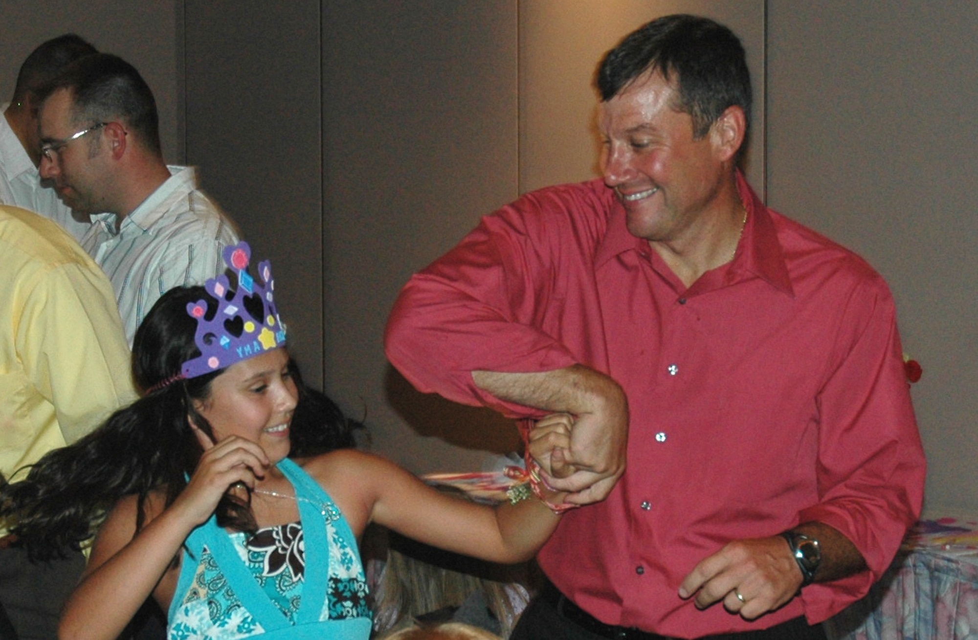Mr. Randall Jones, Deputy Chief of Services, twirls his daughter during a swing dance at the "Daddy Daughter Dance" hosted by the 325th Services Squadron July 24. The 325th Services Squadron organized the event, which brought together more than 50 Tyndall Airmen and their daughters for a special night of food, fun and dancing.