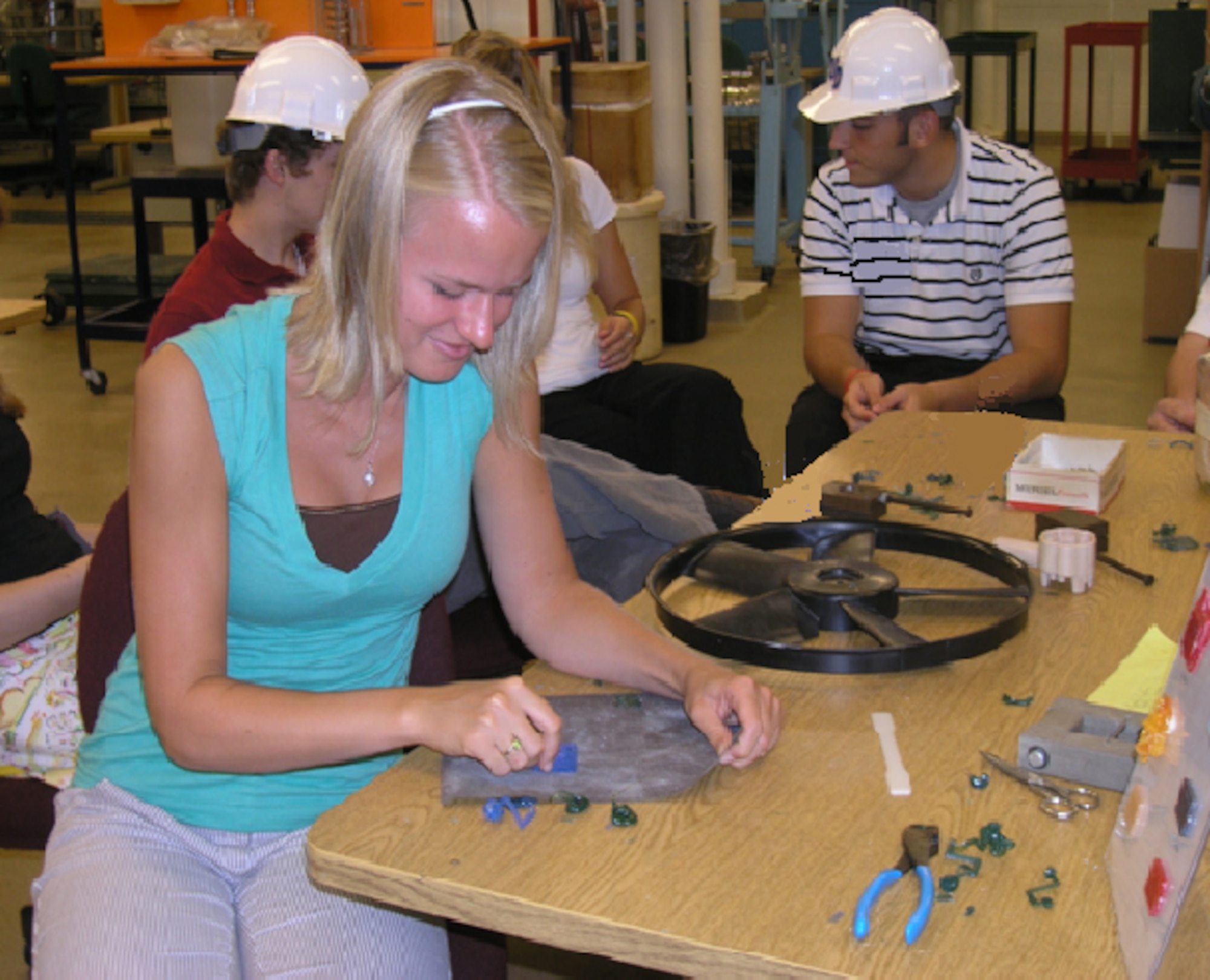 Wright Scholar Mary Untener performs lab experiments at the University of Dayton, a Wright Scholar program partner.  The Wright-Patterson Air Force Base program challenges young men and women considering careers in science, technology engineering and mathematics. (U.S. Air Force photo)