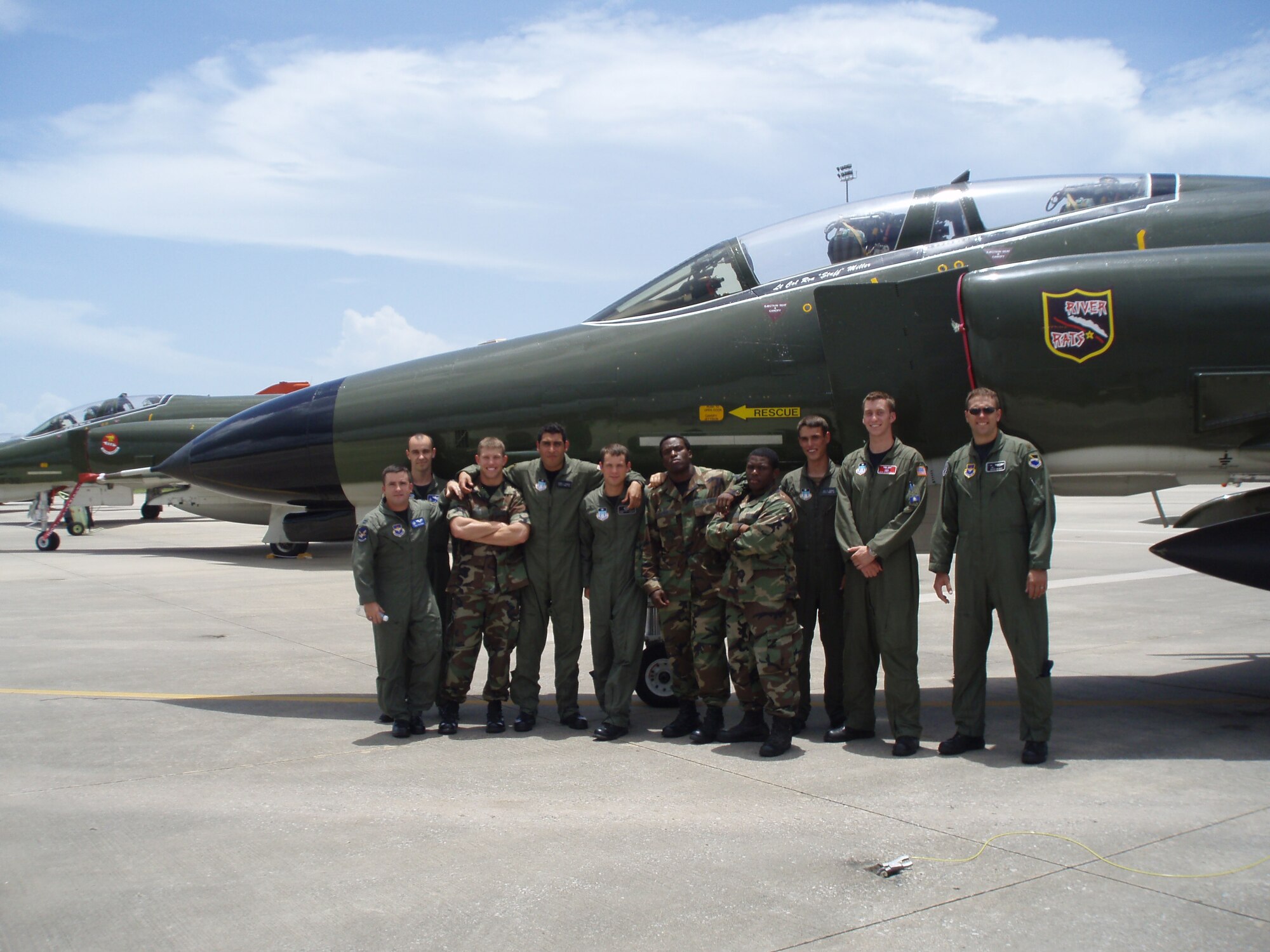 Cadets from the Air Force Academy descended on Tyndall Air Force Base for a two-week base visit in July. Here, the group gathers for a photo in front of an F-4 assigned to the 53rd Weapons Evaluation Group. The cadets, who participated in the "Operations Air Force" program, shadowed officers and enlisted, learned about Tyndall's training mission, and participated in volunteer opportunities in the local community.