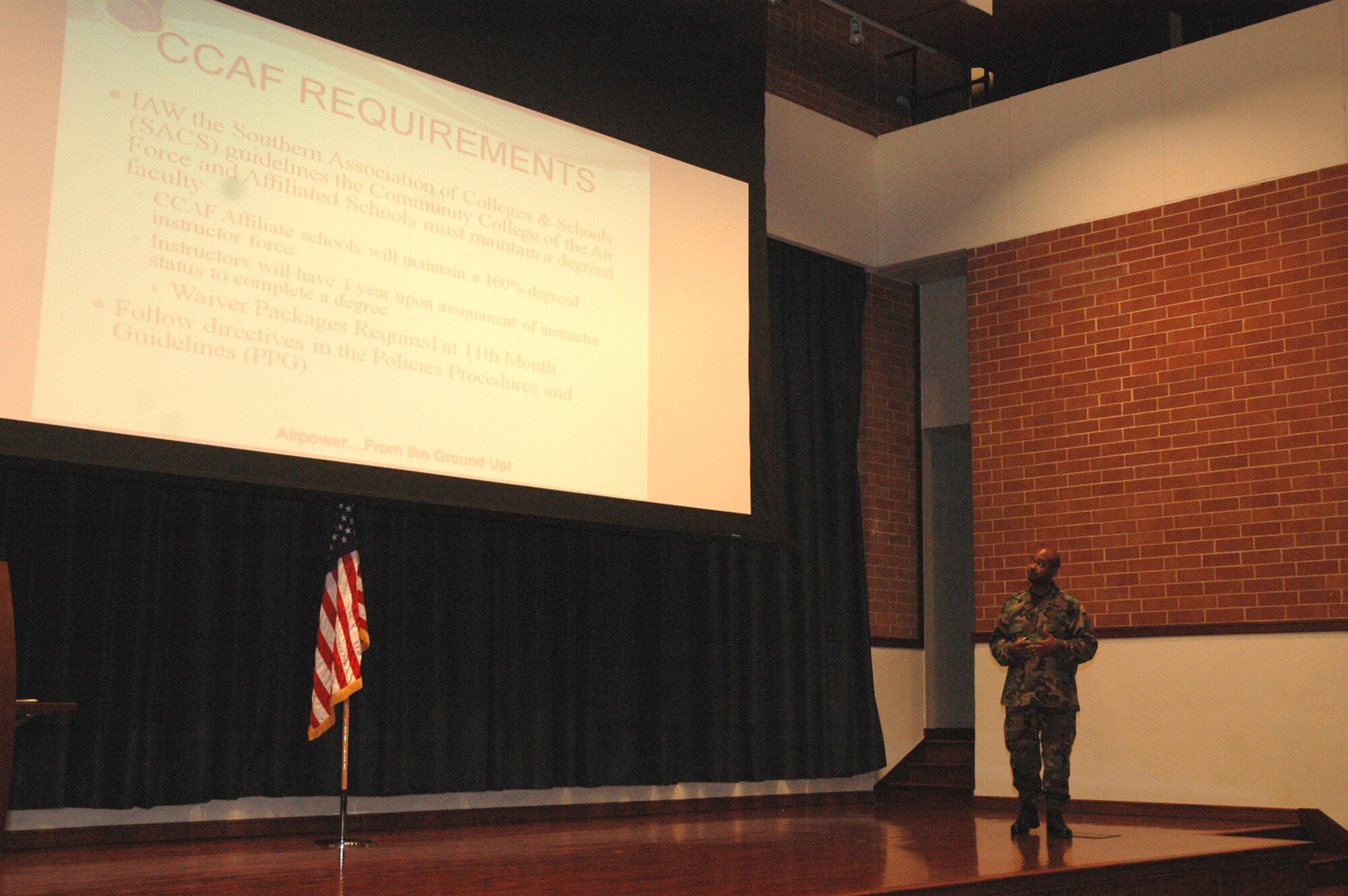 Tech. Sgt. Kendrick Ross, from the U.S. Air Force Expeditionary Center's Curriculum/Instructor Development Division, talks to members of the 421st Combat Training Squadron during an in-service training seminar in the Center's Grace Peterson Hall July 29, 2008, on Fort Dix, N.J.  Sergeant Ross discussed the details for USAF EC instructors on achieving Community Colllege of the Air Force certification and related topics.  (U.S. Air Force Photo/Tech. Sgt. Scott T. Sturkol)