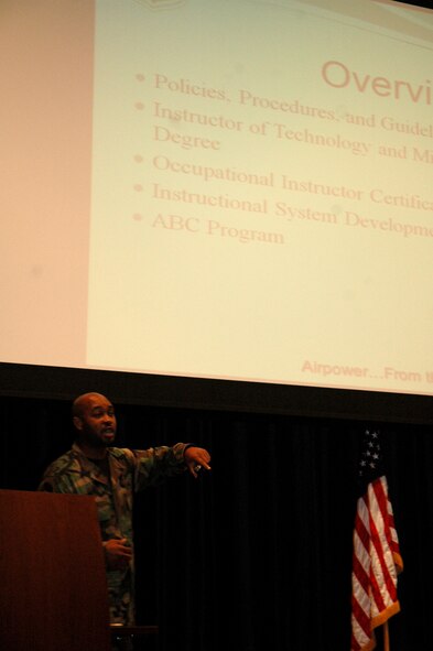 Tech. Sgt. Kendrick Ross, from the U.S. Air Force Expeditionary Center's Curriculum/Instructor Development Division, talks to members of the 421st Combat Training Squadron during an in-service training seminar in the Center's Grace Peterson Hall July 29, 2008, on Fort Dix, N.J.  Sergeant Ross discussed the details for USAF EC instructors on achieving Community Colllege of the Air Force certification and related topics.  (U.S. Air Force Photo/Tech. Sgt. Scott T. Sturkol)