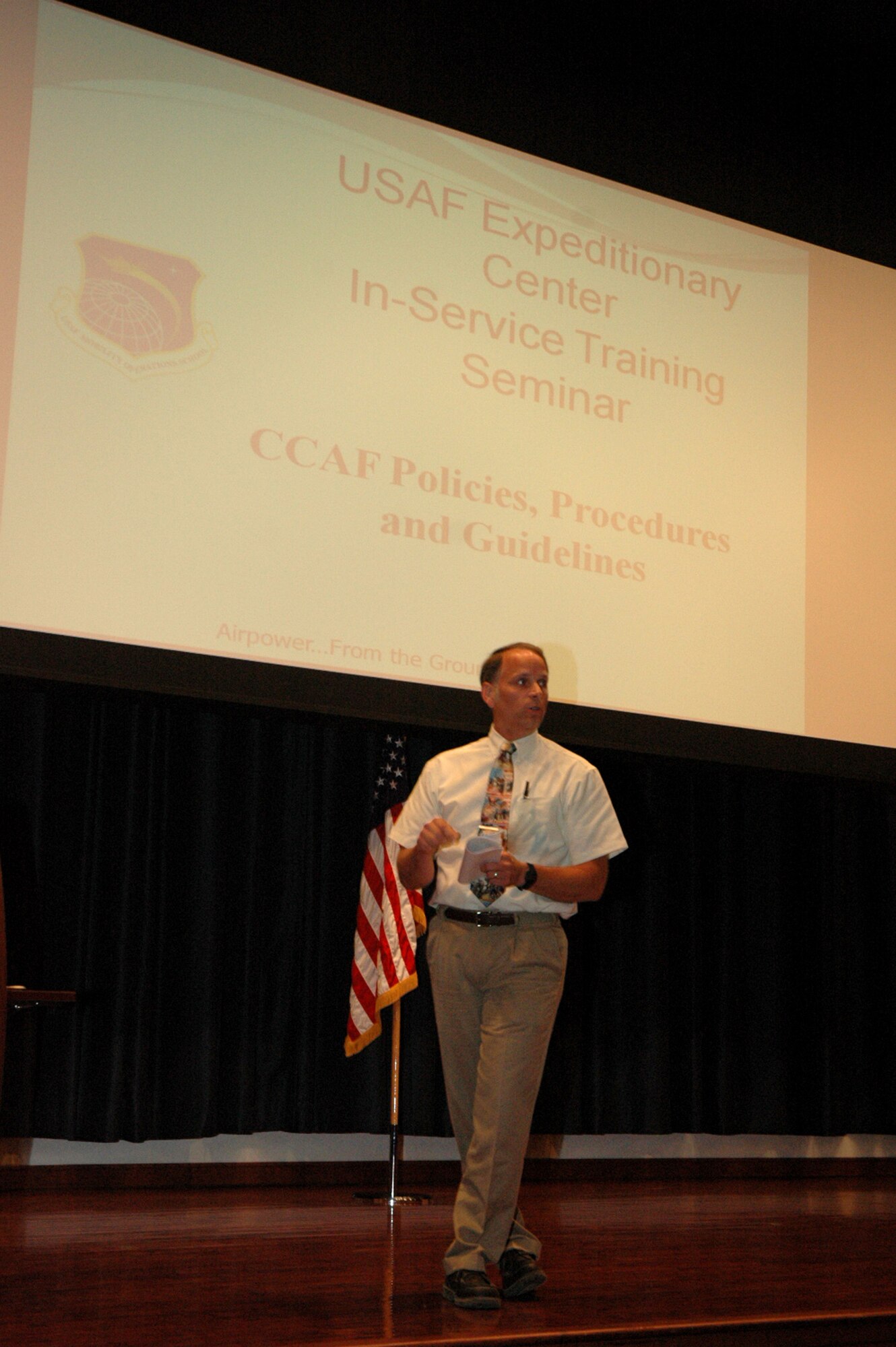 Mr. Philip Mohasci, from the U.S. Air Force Expeditionary Center's Curriculum/Instructor Development Division, talks to members of the 421st Combat Training Squadron during an in-service training seminar in the Center's Grace Peterson Hall July 29, 2008, on Fort Dix, N.J.  Mr. Mohasci, the chief of the Curriculum/Instructor Development Division that falls under the Mobility Operations School, discussed the positive results of a recent compliance visit by the Community Colllege of the Air Force which found that none of the Center's 200-plus instructors were lacking in the necessary credentials.  (U.S. Air Force Photo/Tech. Sgt. Scott T. Sturkol)