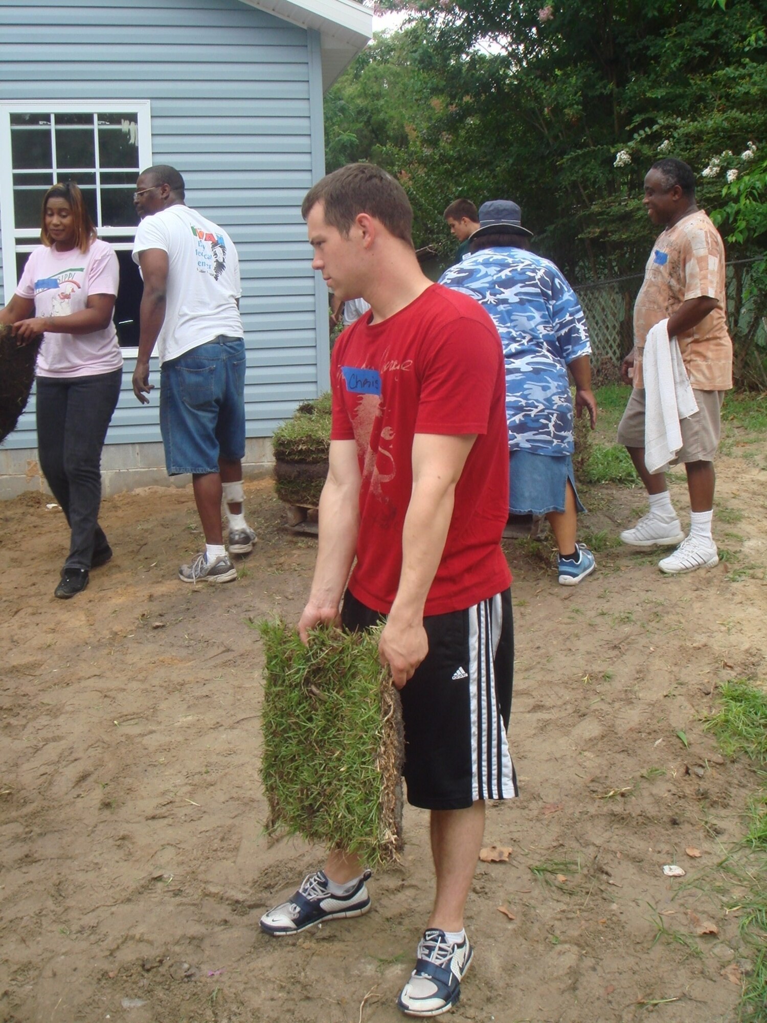 Cadet First Class Christopher Nettles, U.S. Air Force Academy cadet, helps landscape a new residence built by local "Habitat for Humanity" volunteers. Cadet Nettles and seven other Air Force Academy cadets visited Tyndall for two-weeks in July as part of the "Operations Air Force Program," which allows cadets to shadow officers and enlisted members at installations throughout the Air Force. During their stay at Tyndall, the cadets shadowed officers, toured the installation and participated in community relations events.