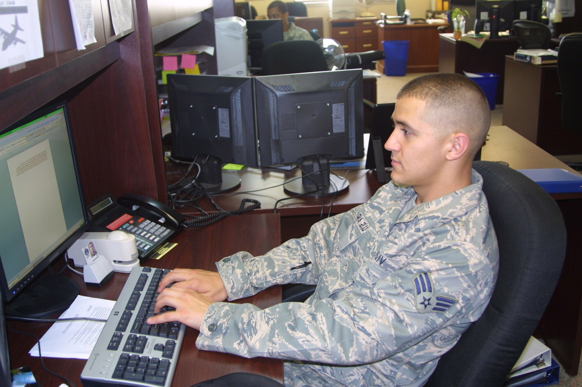 Airman 1st Class David Vijil, 2nd Airlift Squadron, coordinates, schedules and documents all maintenance for  the 440th Airlift Wing’s C-130H aircraft. (U.S. Air Force Photo by Emily Smith)