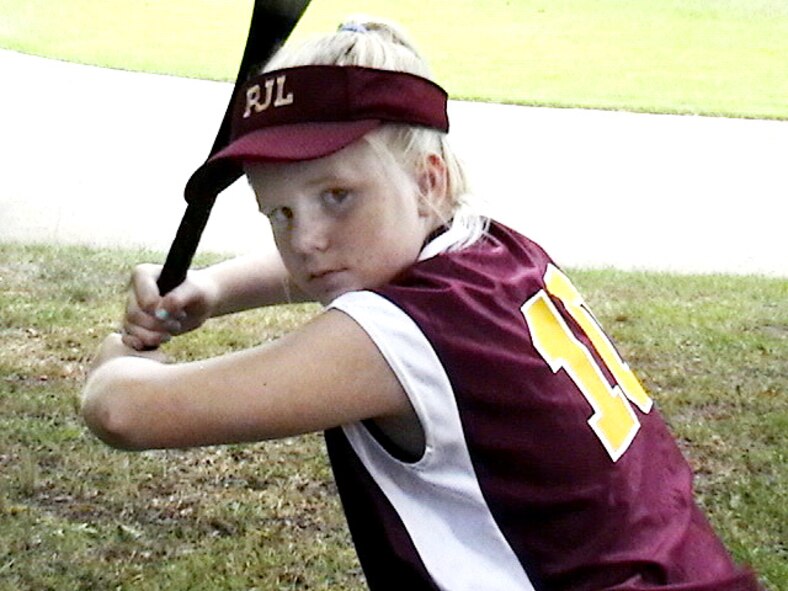 Julia Bell, daughter of Lt. Col. John Bell, 562nd Combat Sustainment Squadron, is the only military dependent on a team that will compete in the Dixie World Series. Courtesy photo