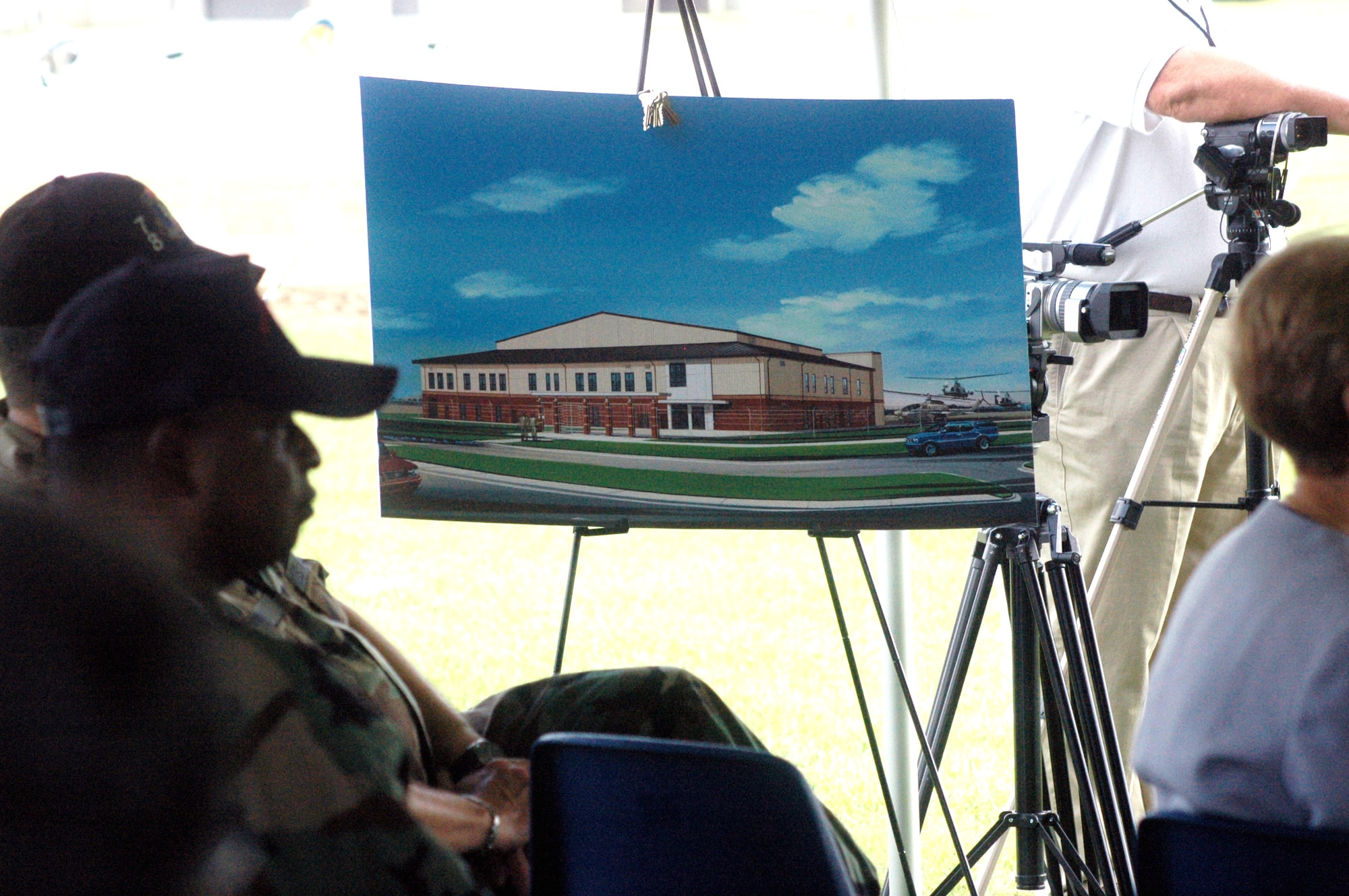 Ground was broken July 30 for a new  Marine Light/Attack Helicopter Squadron hangar. The over $20M hangar will be more than 40,000 sq. ft. and will contain administrative space, an armament room and maintenance areas. U. S. Air Force photo by Sue Sapp