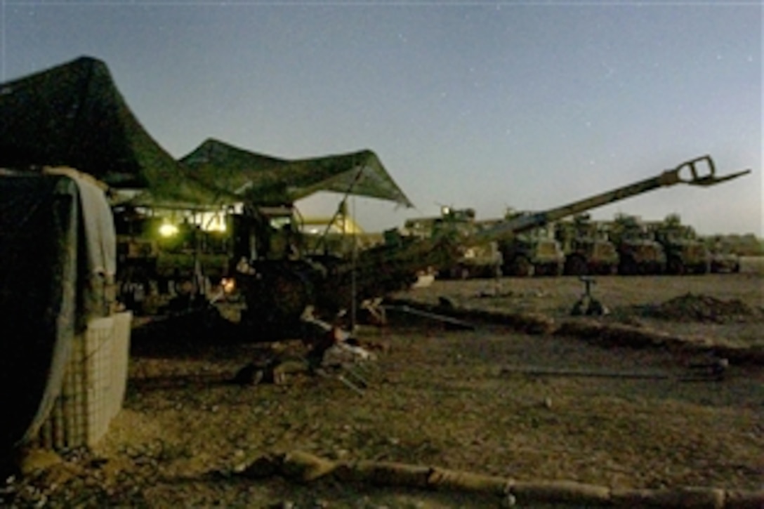 U.S. Marines set up their artillery cannons at a forward operating base in Helmand province, Afghanistan, July 23, 2008. The Marines are assigned to Alpha Battery, 1st Battalion, 6th Marine Regiment.