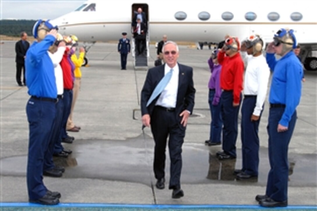 Deputy Defense Secretary Gordon England passes through honor sideboys upon his arrival to Naval Air Station Whidbey Island, Oak Harbor, Wash., July 29, 2008. England is touring Whidbey Island as part of multiple West Coast visits. 