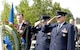 In observance of the 60th Anniversary of the Air Force Office of Special Investigations a wreath is placed at the Air Force Memorial Aug. 1. Saluting the wreath in a moment of tribute to the men and women of AFOSI are (l to r) Mr. Douglas Thomas, AFOSI Executive Director, Command Chief Master Sgt. Chris Redmond, AFOSI Command Chief and Brig. Gen. Dana Simmons, AFOSI commander. (U.S. Air Force photo/Tech. Sgt. John Jung)