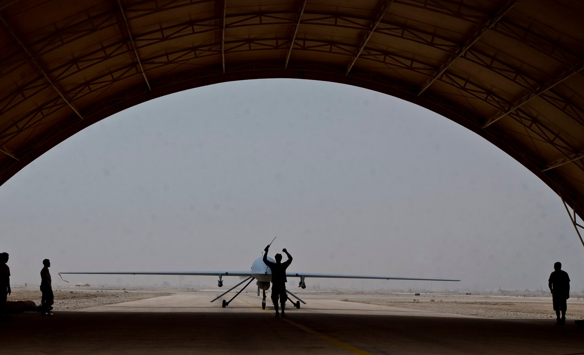 ALI BASE, Iraq -- An MQ-1B Predator unmanned aircraft, 46th Expeditionary Reconnaissance Squadron Detachment 1, taxis in after a mission Aug. 1, 2008. Through the use of advanced capabilities, focused doctrine and detailed training, the Predator provides integrated and synchronized close air combat operations, to include intelligence, surveillance and reconnaissance. (U.S. Air Force photo/Airman 1st Class Christopher Griffin)