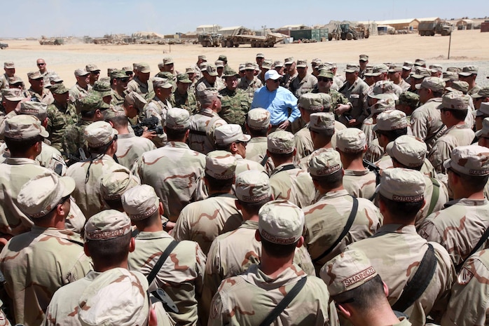 Georgian Minister of Defense Bacho Akhalaia gathers with the 31st Georgian Battalion aboard Camp Delaram II, during his visit to the camp, June 14. Brigadier Gen. Joseph Osterman, 1st Marine Division (FWD) Commanding General, was also in attendance. While the minister and his entourage were aboard the camp, they received a brief from both the Georgian staff as well as Col. Paul Kennedy, Regimental Combat Team 2 commanding officer. The brief touched on topics concerning the logistics of the Georgian unit as well plans for future implementation of the Georgian battalion throughout RCT-2’s battle space. For the first time, a Georgian battalion is working alongside a Marine regimental combat team. Through the combined efforts of two NATO forces working for a common goal, the Georgians, along with RCT-2, plan to leave a positive impact in the Helmand province.