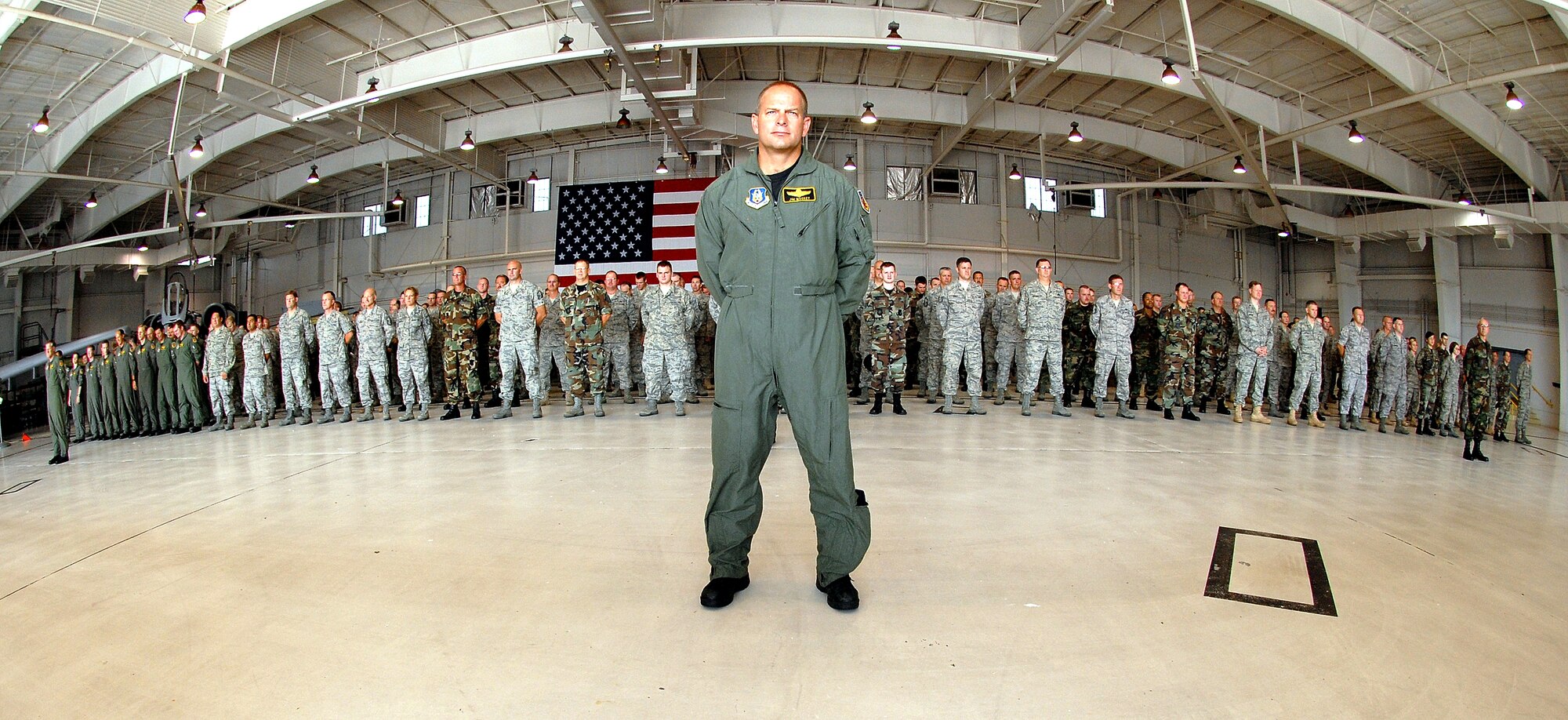 Led by Col. James Mackey, 442nd Fighter Wing vice commander, the men and women of the wing stand in formation at the installation of Col. Mark Clemons as the wing's new commander Aug. 2, 2008. Colonel Clemons replaces Col. Steve Arthur who leaves the 442nd to be the vice commander of 10th Air Force, at Naval Air Station Joint Reserve Base Ft. Worth, Texas. The 442nd FW is an Air Force Reserve Command A-10 Thunderbolt II unit at Whiteman Air Force Base, Mo. (US Air Force photo/Master Sgt. Bill Huntington)