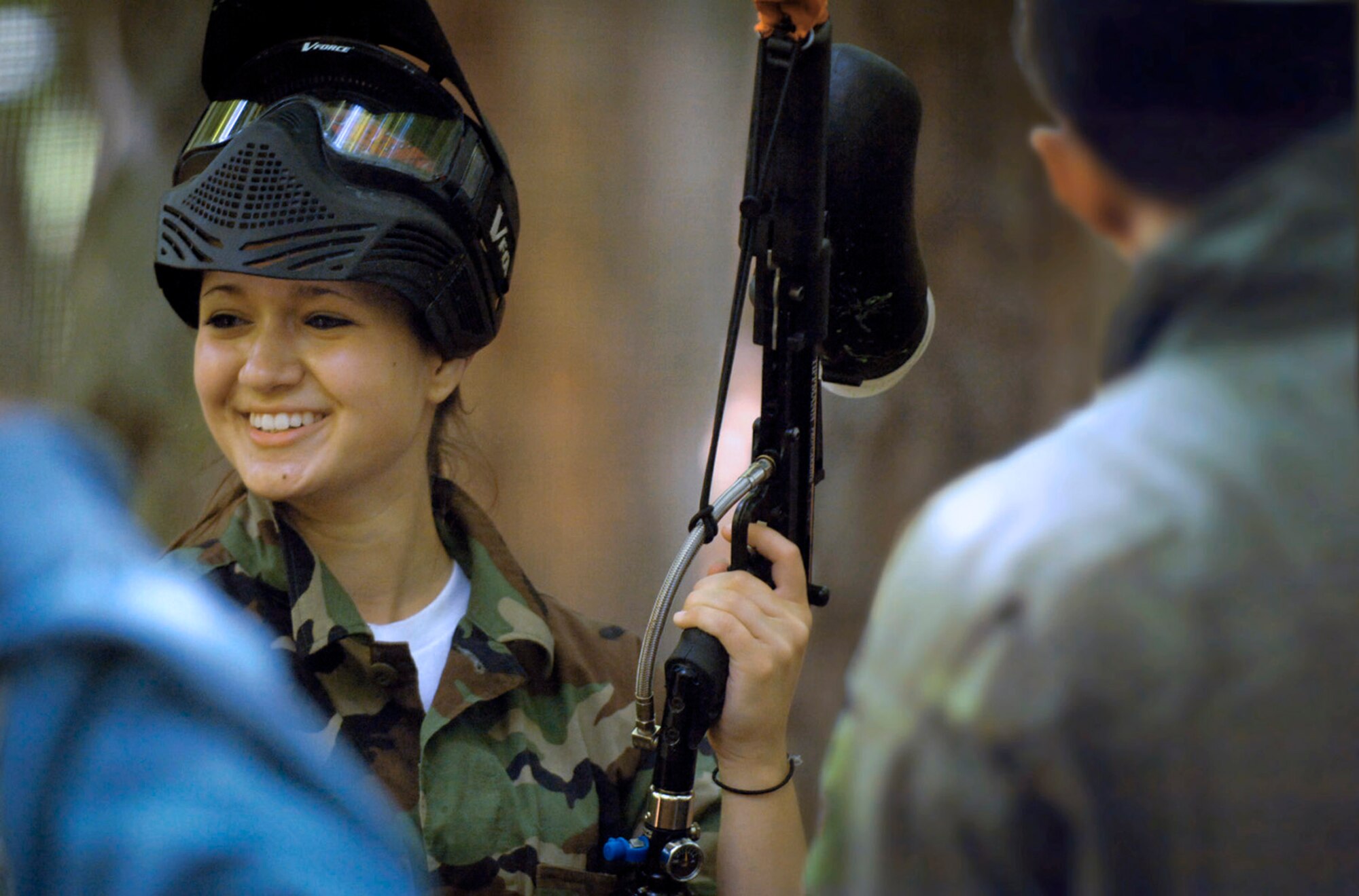 Sixteen-year-old Megan Repetski of Royal Air Force Alconbury, England, chats with fellow European Keystone Club Leadership Summit attendees following a round of paint ball at Vogelweh Military Complex in Kaiserslautern, Germany. More than 100 teens from 11 U.S. Air Forces in Europe bases attended the week long summit at Ramstein Air Base, Germany, from July 28 to Aug. 1.  (U.S. Air Force photo/Master Sgt. Scott Wagers)