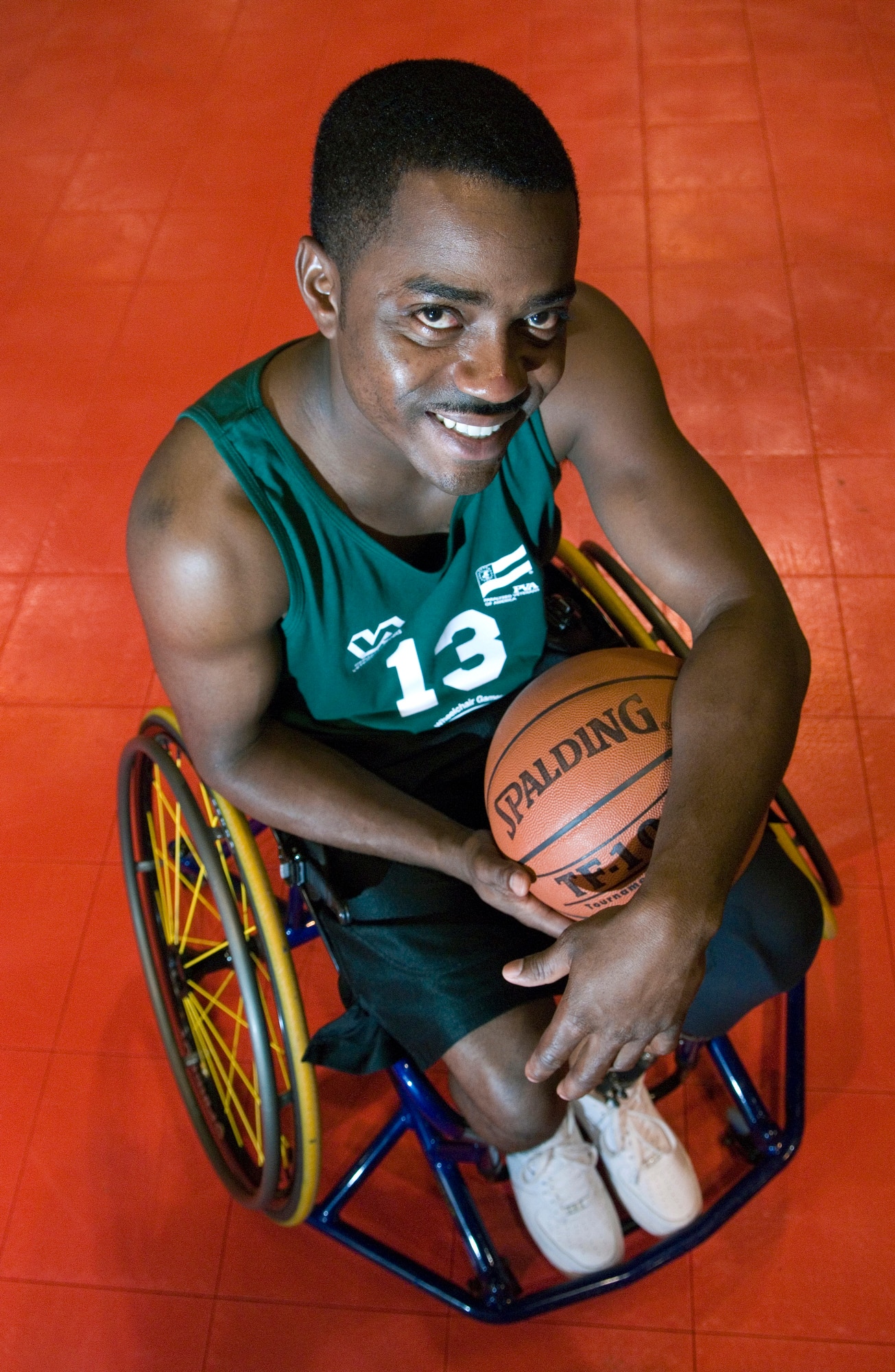 Tech. Sgt. Anthony Felder, competing in his second National Veterans Wheelchair Games, July 29, held in Omaha, Neb., helped his team to earn the gold medal in basketball. Tech. Sgt. Felder lost his left leg in a 2006 motorcycle accident but has received U.S. Air Force approval to remain on active duty as an F-15 crew chief. Tech. Sgt. Felder is currently stationed as an active-duty patient at Andrews Air Force Base, MD.
(U.S. Air Force photo/Staff Sgt. Bennie J. Davis III)