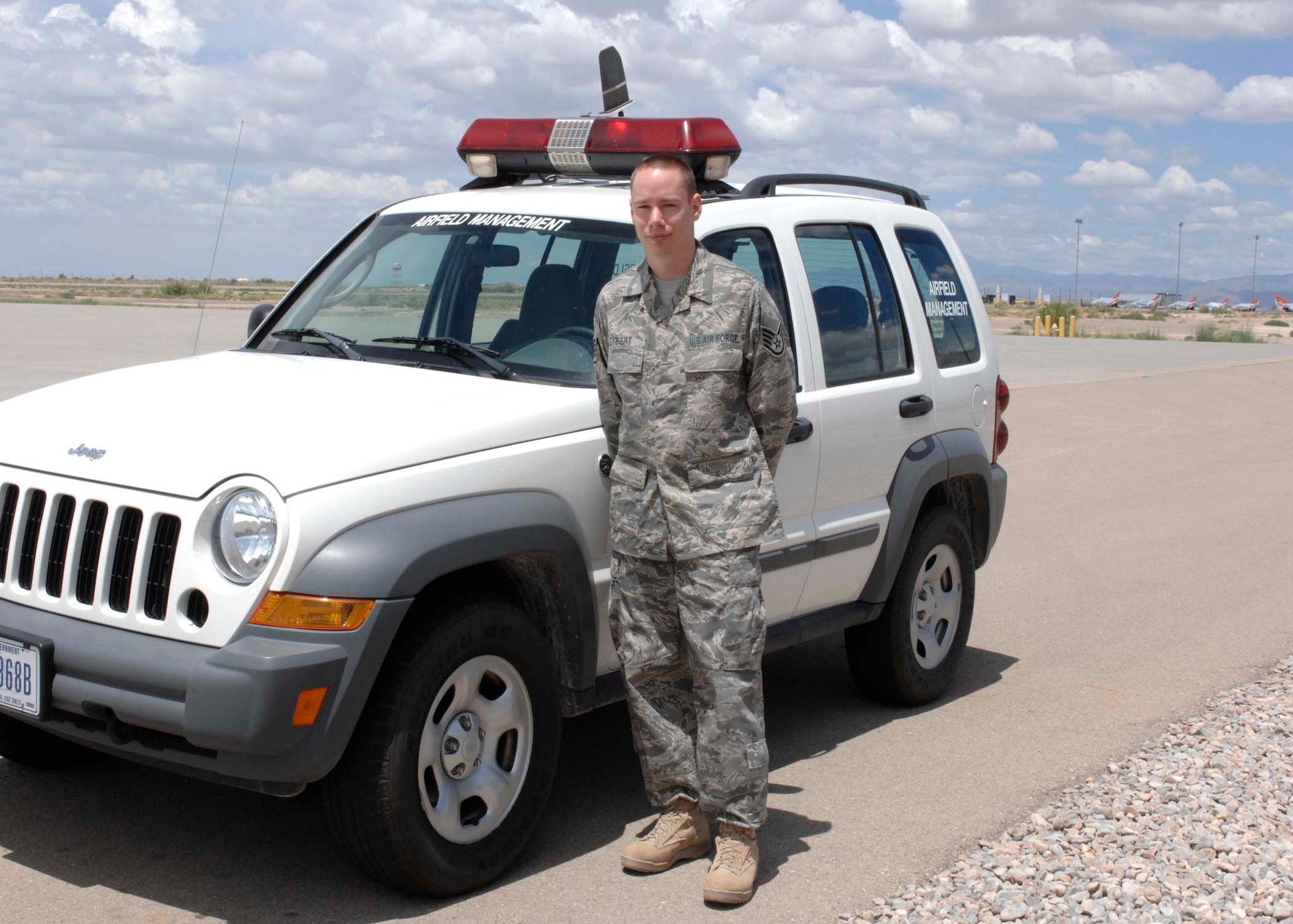Staff Sgt. Alexander Zybert, 49th Operations Support Squadron, airfield management, returns from a four month deployment to Ali Air Base, Iraq, July 25 at Holloman Air Force Base, N.M. While deployed he put in several projects to change the airfield and put bed down's for Army 'Helo' missions. (U.S. Air Force photo/Airman 1st Class Rachel A. Kocin)