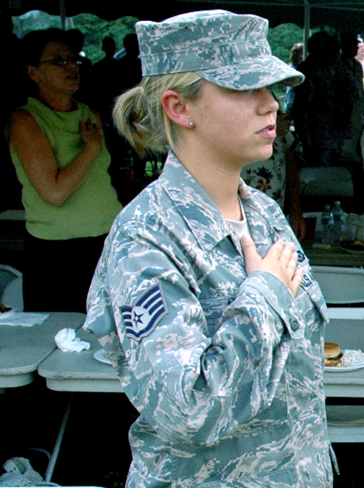 Staff Sgt. Amanda Lore, from the U.S. Air Force Expeditionary Center's 421st Combat Training Squadron, cites the Pledge of Allegiance, during the 2008 Burlington County Military Affairs Committee "Medal of Honor" picnic July 31 at the Palmyra Nature Cove.  Nearly 100 military members from all services, including more than 50 Airmen from McGuire Air Force Base, N.J, and Fort Dix, were on hand to attend the picnic. The picnic featured Medal of Honor recipient, former 1st Lt. Brian M. Thacker of the U.S. Army and a Wheaton, Md., resident.  (U.S. Air Force Photo/Tech. Sgt. Scott T. Sturkol)