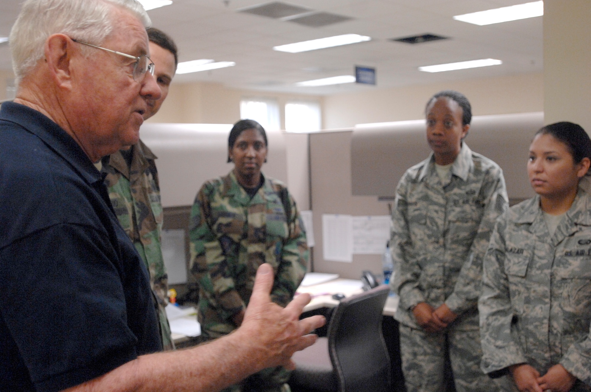 Fifth Chief Master Sergeant of the Air Force Robert Gaylor takes a few minutes to talk with Aviano Airmen during his visit to the base Aug. 1. (U.S. Air Force photo/Airman 1st Class Ashley Wood) 