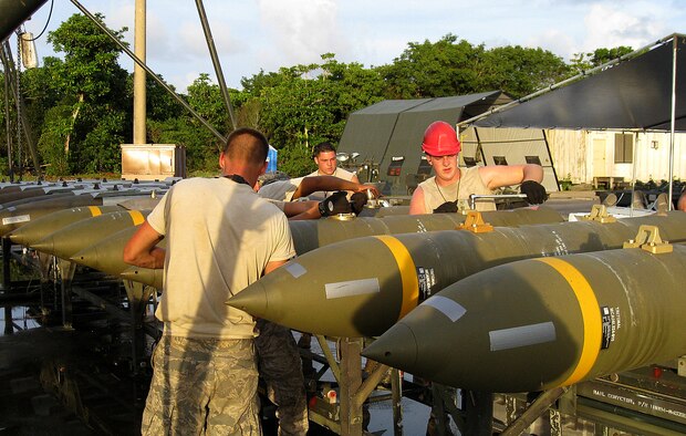Airmen from the 36th Munitions Squadron buildup the Joint Direct Attack Munitions on the Munitions Assembly Conveyor at the at 4E-1 Pad during the Ammunition Production Exercise (CAPEX) that took place here July 28 through Aug. 2. The CAPEX exercise provided unit training in mass production of non-nuclear war reserve munitions and training in mass munitions assembly in support of aircraft generation. (Courtsey photo)