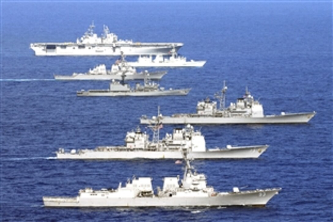 U.S., Canadian and Japanese navy ships transit the Pacific Ocean during a group exercise off the coast of Hawaii in support of Rim of the Pacific, RIMPAC, July 28, 2008. 
RIMPAC is a biennial exercise hosted by U.S. Pacific Fleet that brings together military forces from Australia, Canada, Chile, Peru, Japan, the Netherlands, Singapore, the United Kingdom and the Republic of Korea. 