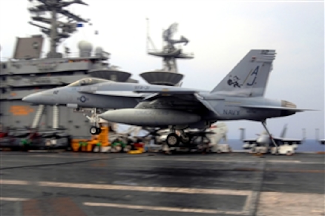 A Navy F/A-18 Super Hornet assigned to the "Tomcatters" of Strike Fighter Squadron 31 makes a successful landing onto the flight deck of the Nimitz-class aircraft carrier USS Theodore Roosevelt, July 23, 2008. The Theodore Roosevelt Carrier Strike Group is participating in Joint Task Force Exercise "Operation Brimstone" off the Atlantic coast. 