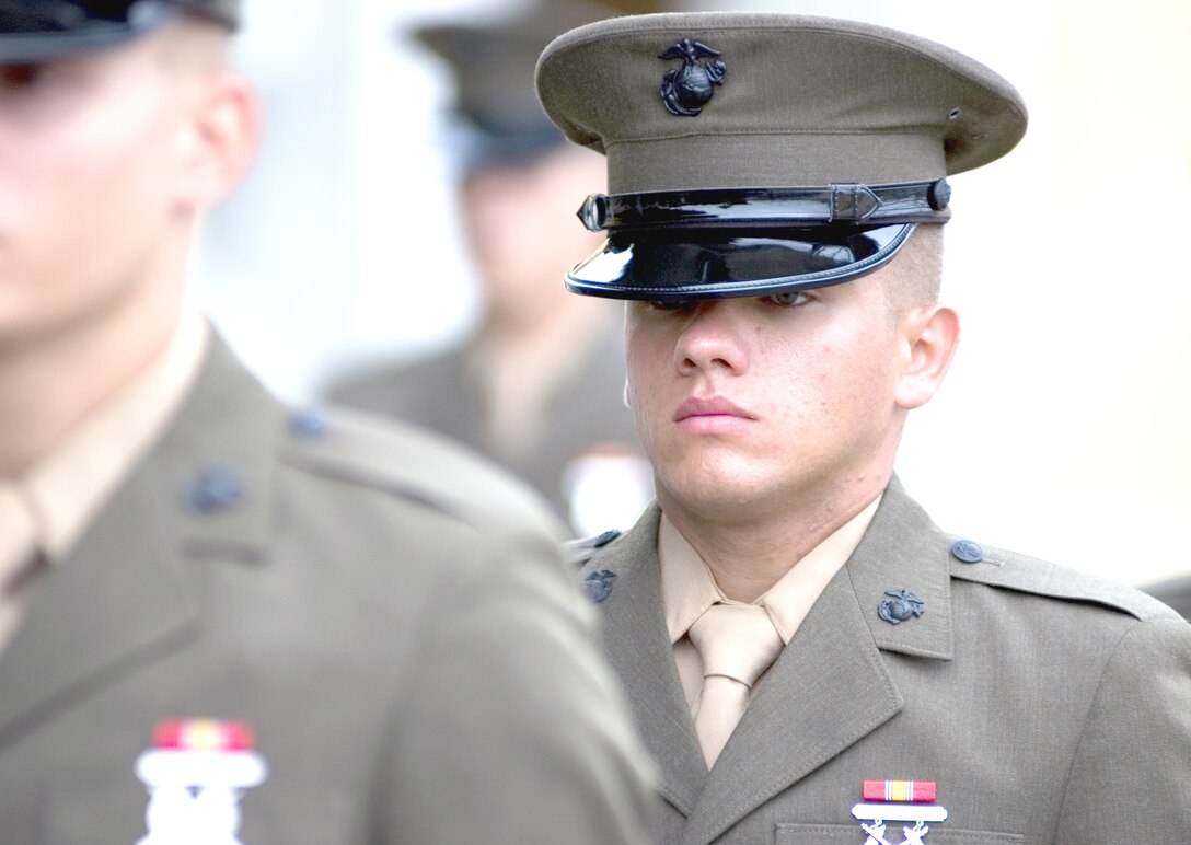 Pvt. Jason Dolan, Platoon 2111, Company E, stands at attention during the unit’s Battalion Commander’s Inspection Tuesday, on Shepherd Memorial Drill Field. The Battalion Commander’s Inspection is one of the final events before their graduation ceremony today.