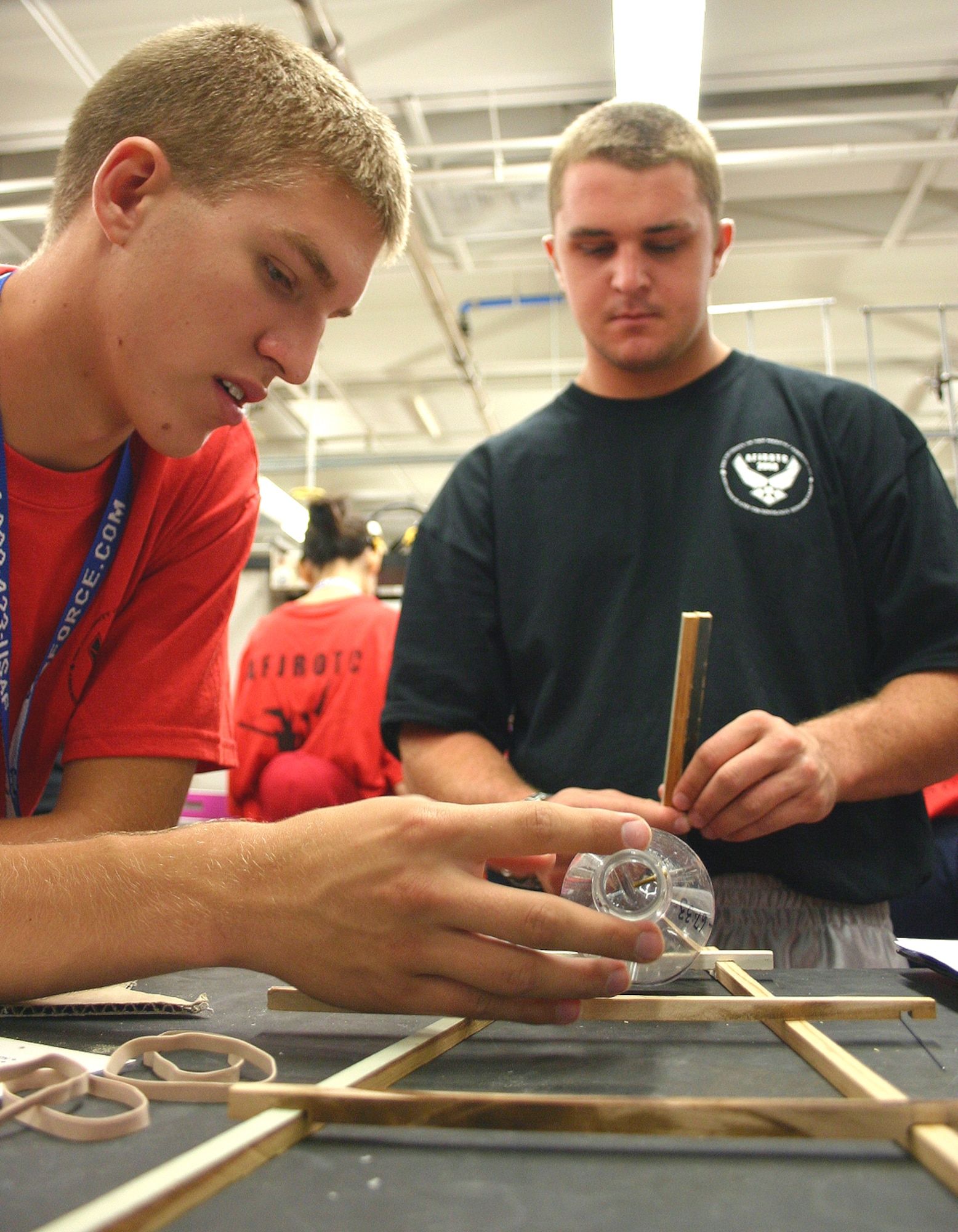 Air Force Junior ROTC Cadets Ryan Moran from South Carolina and John Coleman from California piece together the framework of their rocket car July 29 during the 2008 Air Force Junior ROTC Aerospace and Technology Honor Camp at Albuquerque, N.M. (U.S. Air Force photo/Staff Sgt. Jason Lake)
