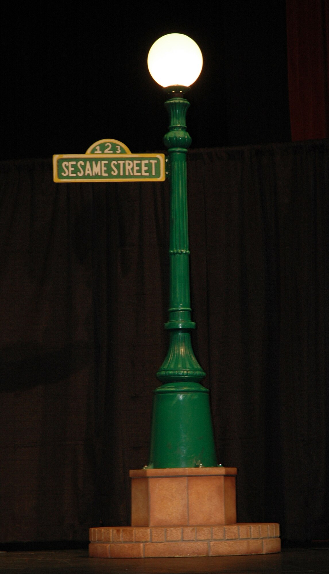 A street lamp directing the way on how to get to Sesame Street.  (U.S. photo by Airman 1st Class Robby Hedrick)