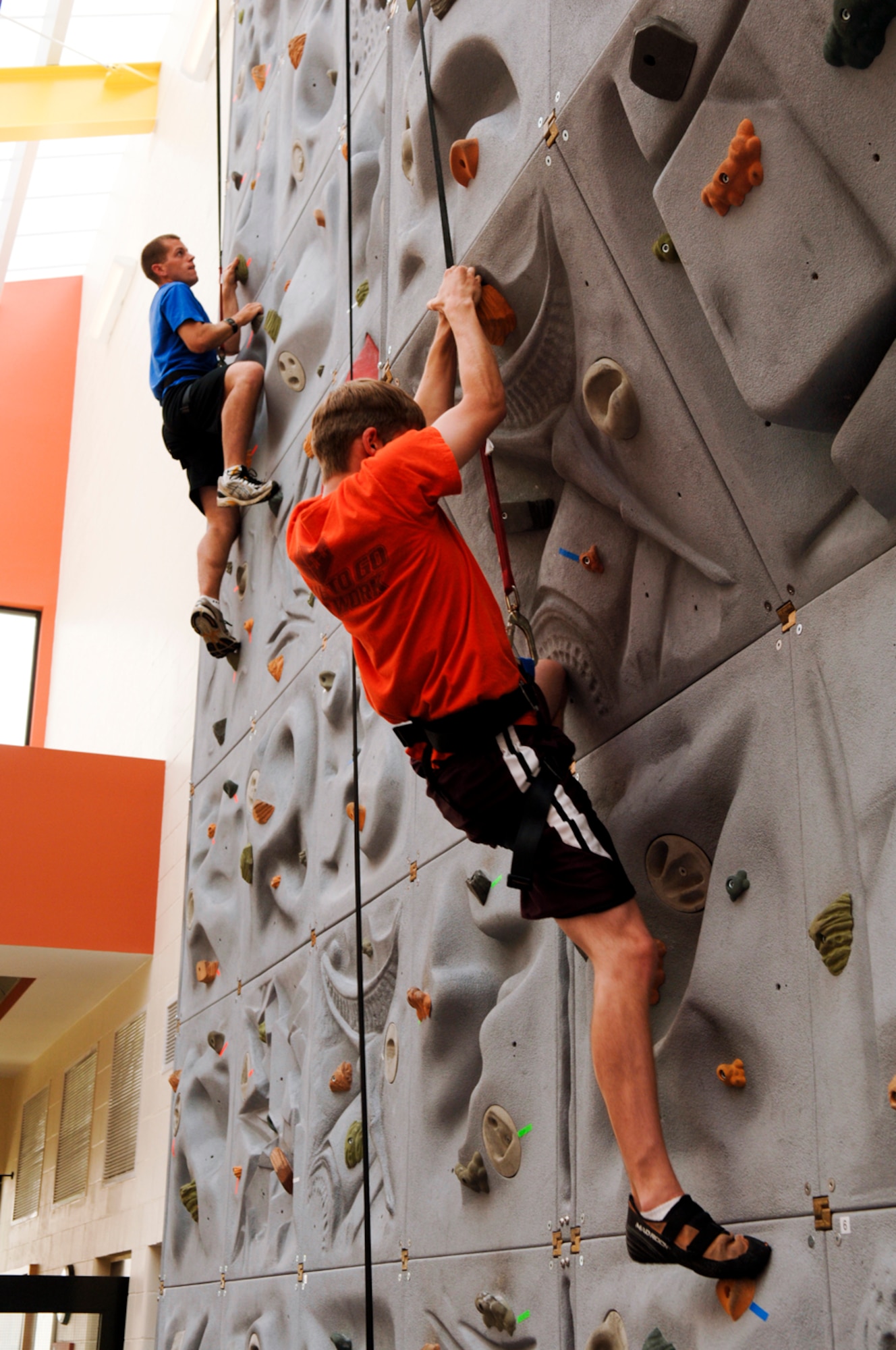 HANSCOM AFB, Mass. – Participants in the Commander’s Cup Challenge rock climbing competition scale the wall at the Fitness Center on Aug. 1.  The 551st Electronic Systems Wing received first place honors in the competition that included a number of sporting events.  (U.S. Air Force photo by Rick Berry)