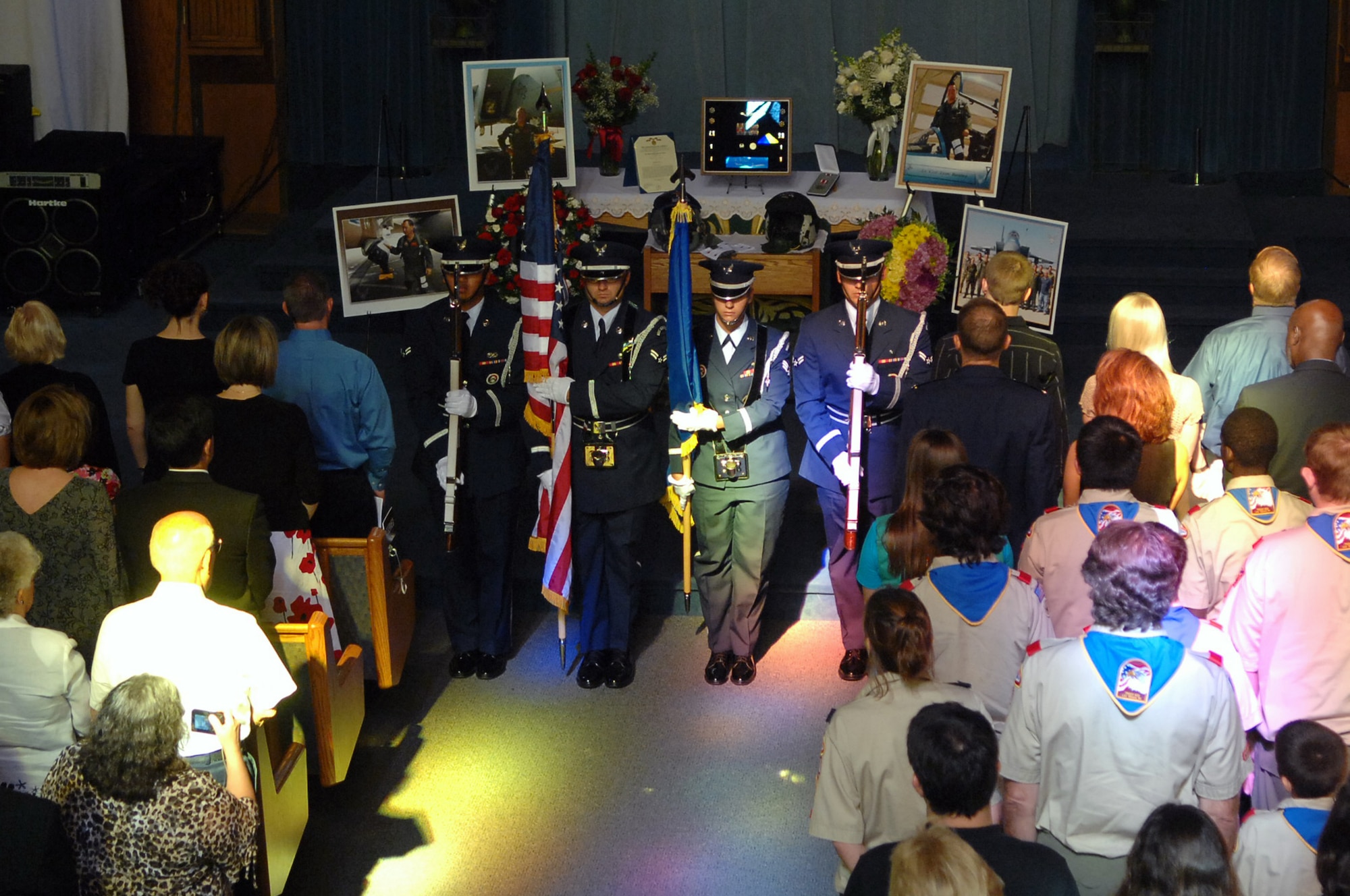 Members of the Nellis Air Force Base Honor Guard present the Colors at  Lt. Col. Thomas Bouley's Memorial Service held at the Base Chapel on Nellis Air Force Base, Nev., Aug. 4, 2008.
(Photo by Senior Airman Jason Huddleston, Released)
