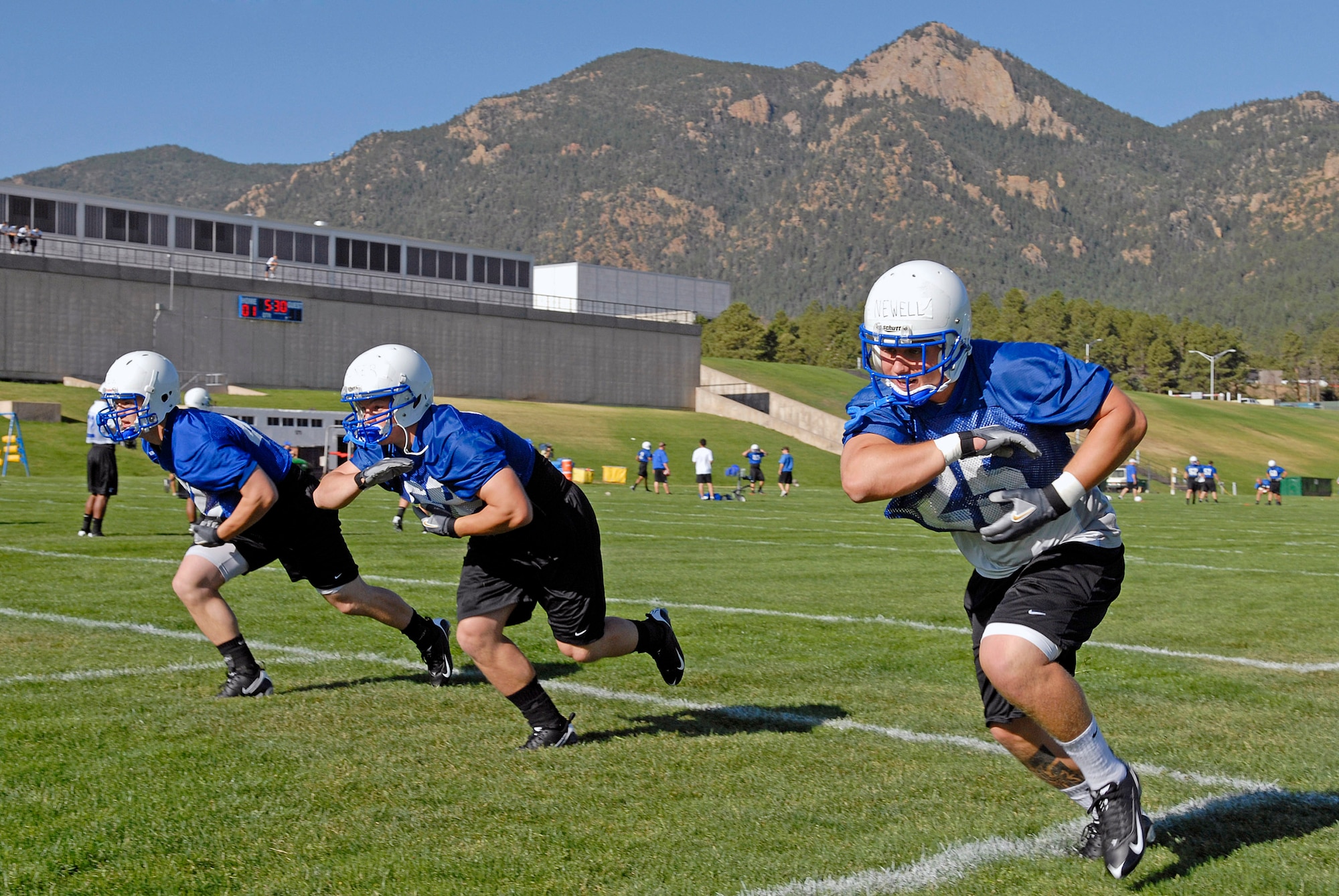 Fullback Cadet 1st Class Todd Newll (25) participates in drills as the Falcons practice in preseason camp July 31 at the U.S. Air Force Academy in Colorado. The Falcons had their best Mountain West Conference record in school history in 2007 with a 9-4 record. (U.S. Air Force photo/Mike Kaplan) 
