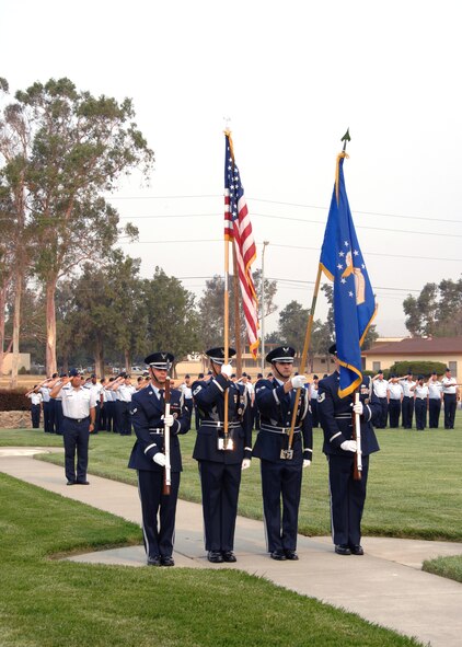 Members of the Travis Air Force Base Honor Guard present the colors during a change of command ceremony for the 60th Mission Support Group.  USAF photo by Civ/ Nan Wylie