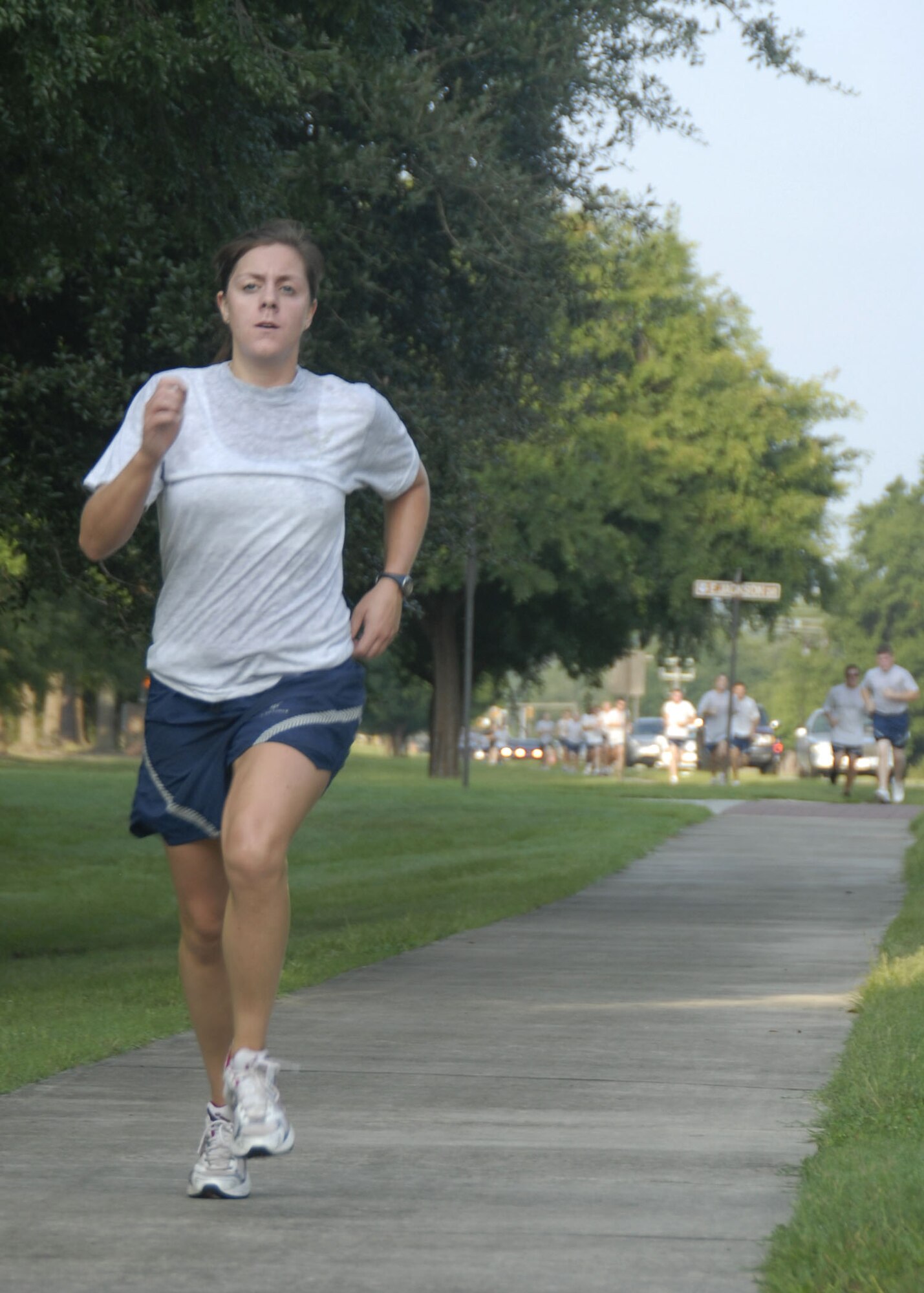 Lorraine Burke finishes in first place at the base fitness center with a time of 22:24 for the females during the commander's 5,000 meter fitness challenge Aug. 1. This month's fitness challenge was designated by the commander to motivate Airmen for the operational readiness inspection that started Aug. 3. Burke is the facilities chief for the 437th Civil Engineer Squadron. (U.S. Air Force photo/Airman 1st Class Cynthia Spalding) 