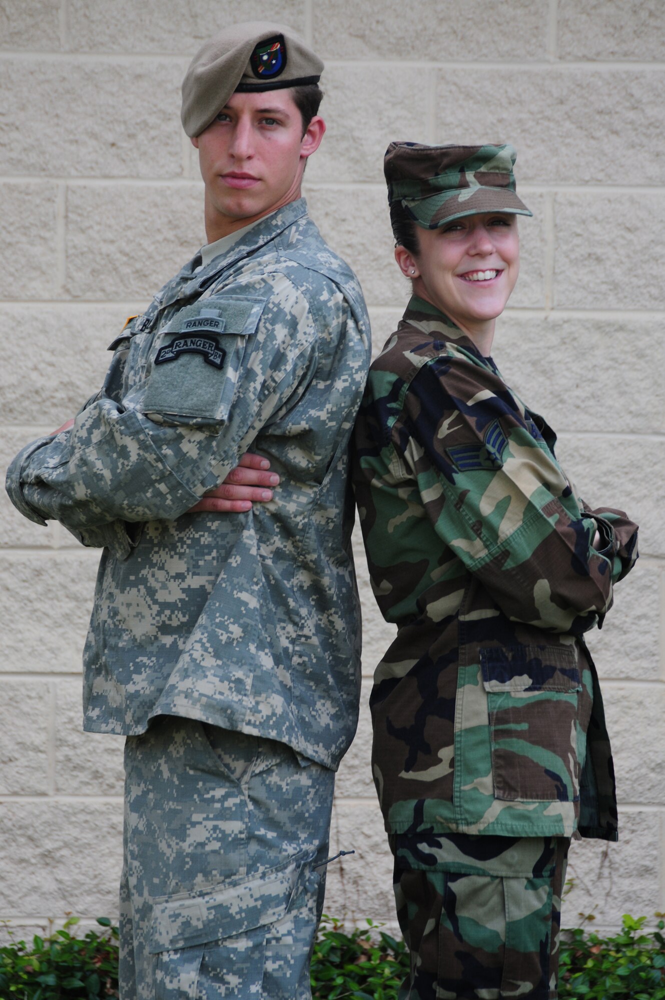 Siblings Army Sgt. William "Trey" Bullock III (left) and Senior Airman Mary Bullock (right) say their grandfather, a World War II veteran, was their greatest influence growing up. Sgt. Bullock followed in his footsteps by becoming an Army Ranger. Inspired by both her grandfather and her younger brother, Airman Bullock joined the Air Force. Today, the brother and sister duo sometimes find themselves working together despite being in different services. (U.S. Air Force photo/Senior Master Sgt. Terry Blevins)
